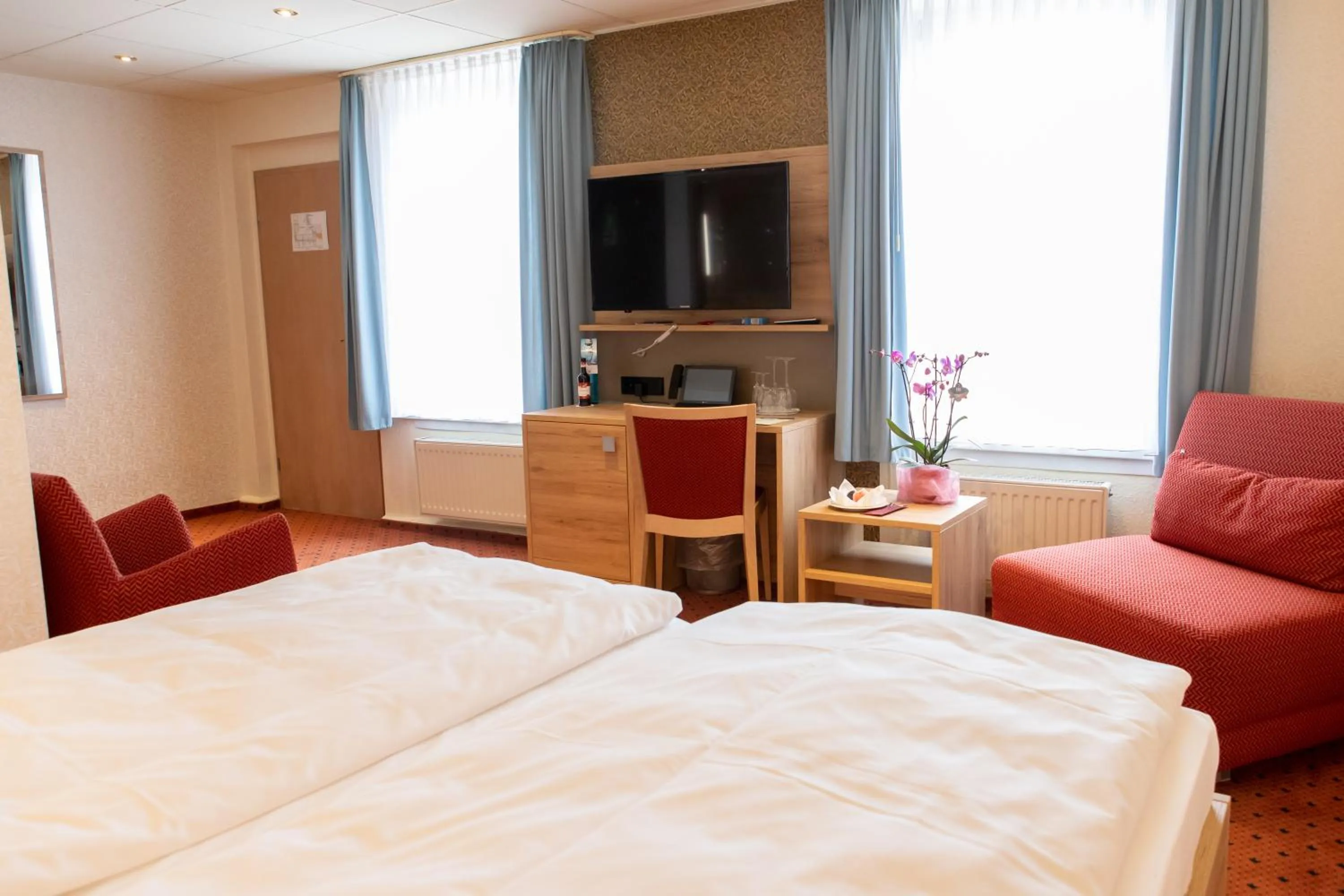 Bed in Flair Hotel Deutsches Haus