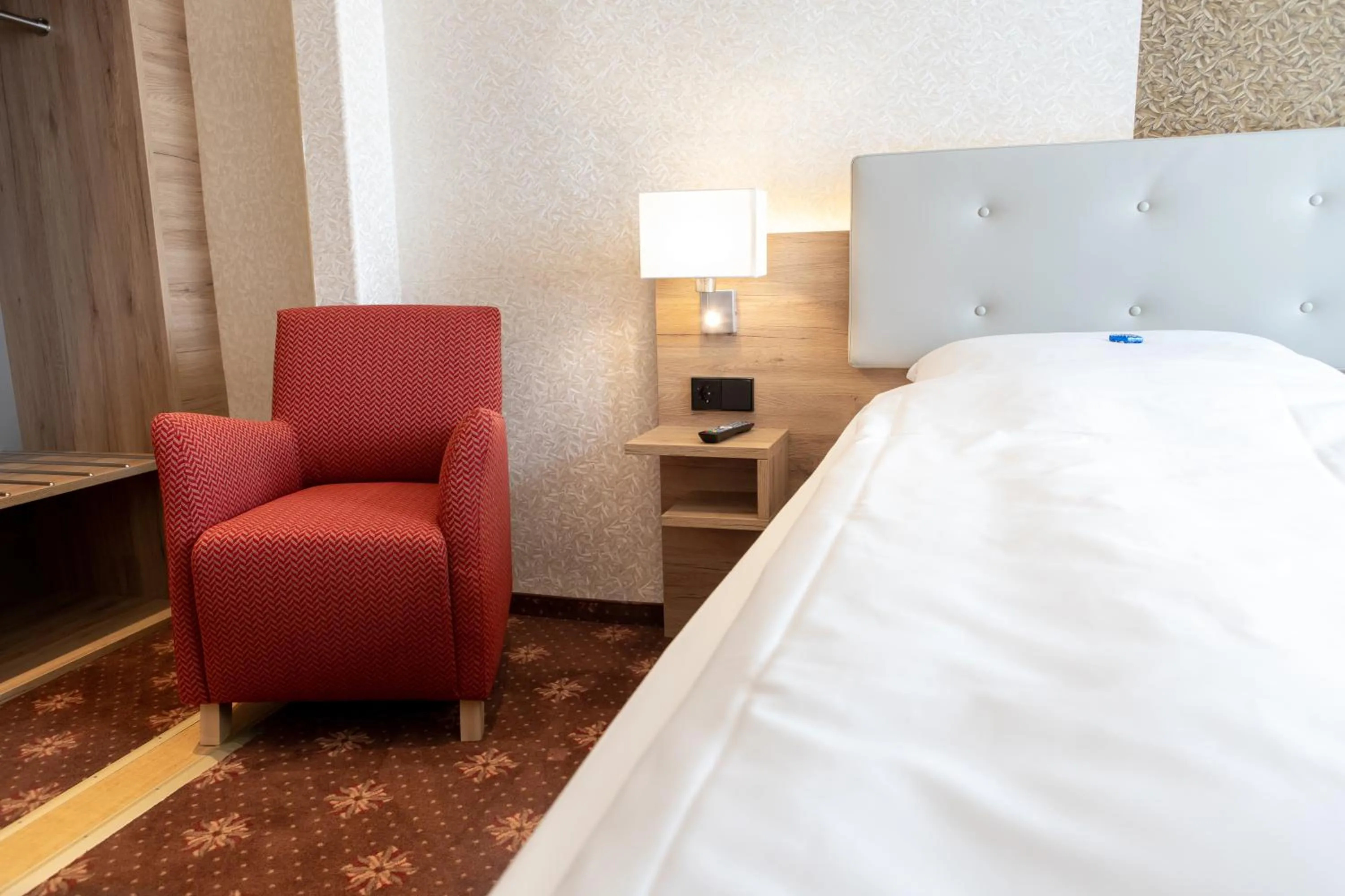 Bed in Flair Hotel Deutsches Haus