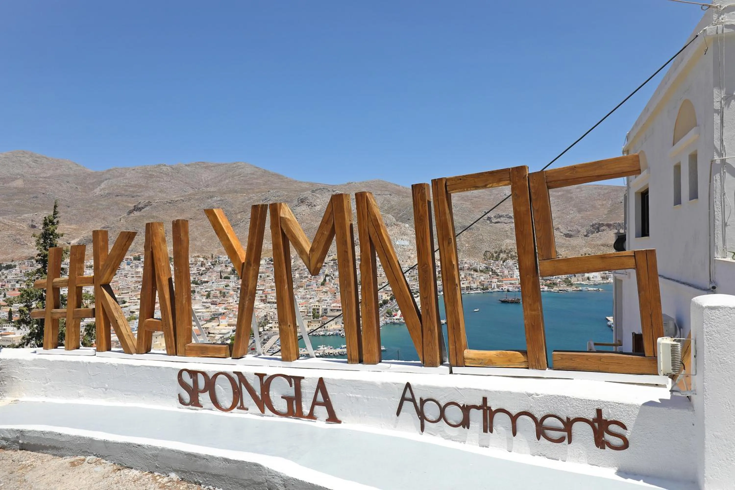 Property logo or sign in Spongia Apartments Kalymnos
