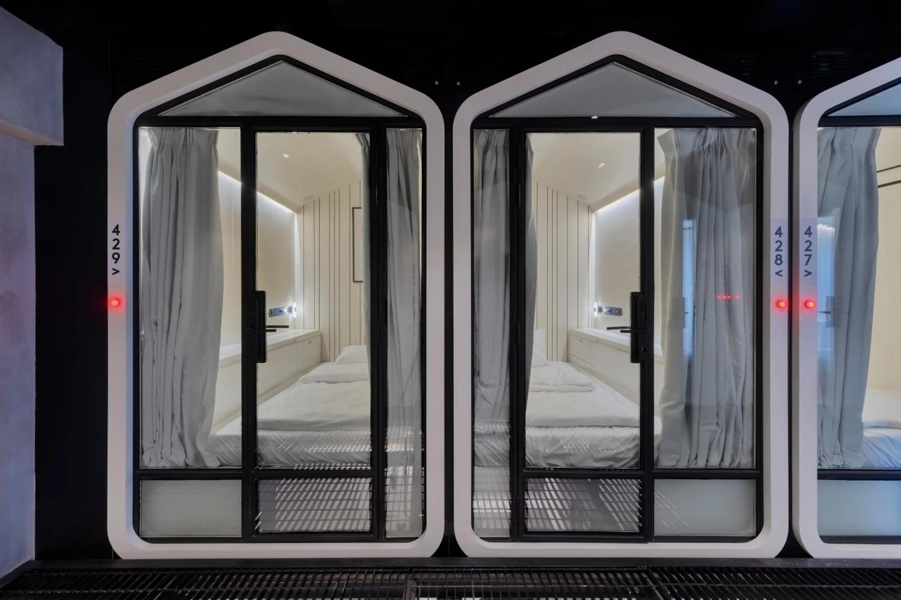 Photo of the whole room, Bed in The O Pod Capsule Hotel