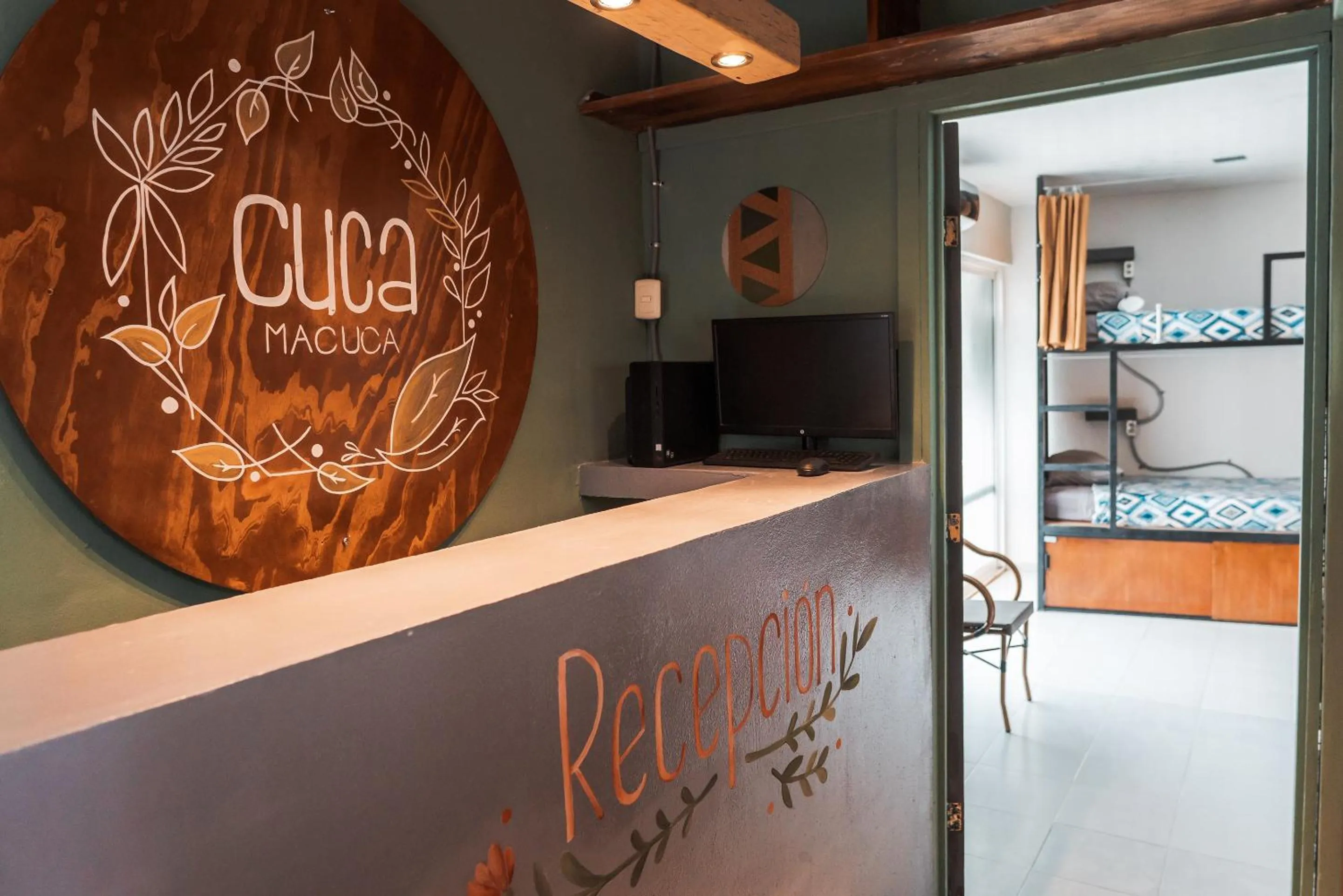 Property logo or sign in Hostal Cuca Macuca