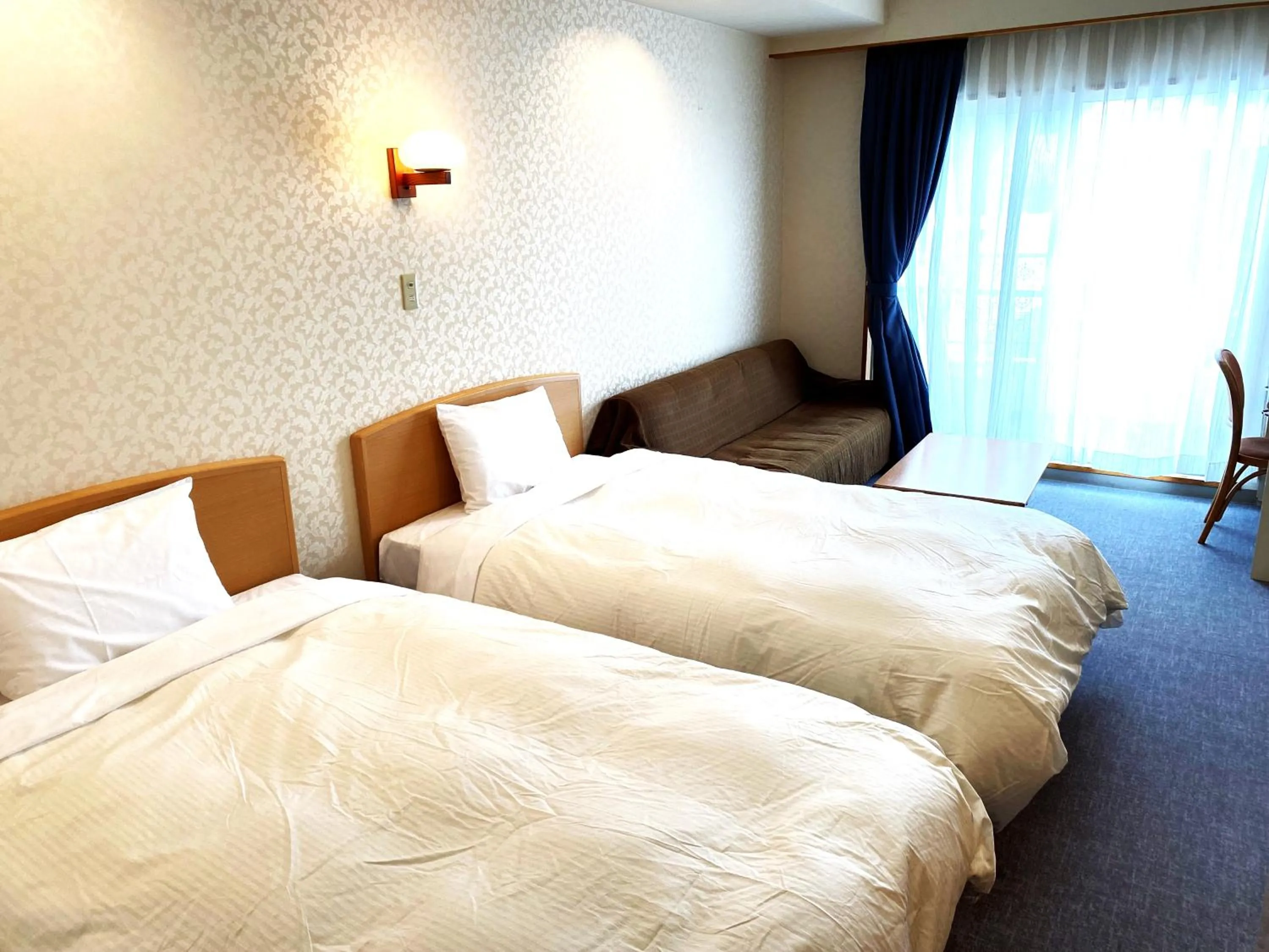 Bed in Hotel Kosaka Gold Palace