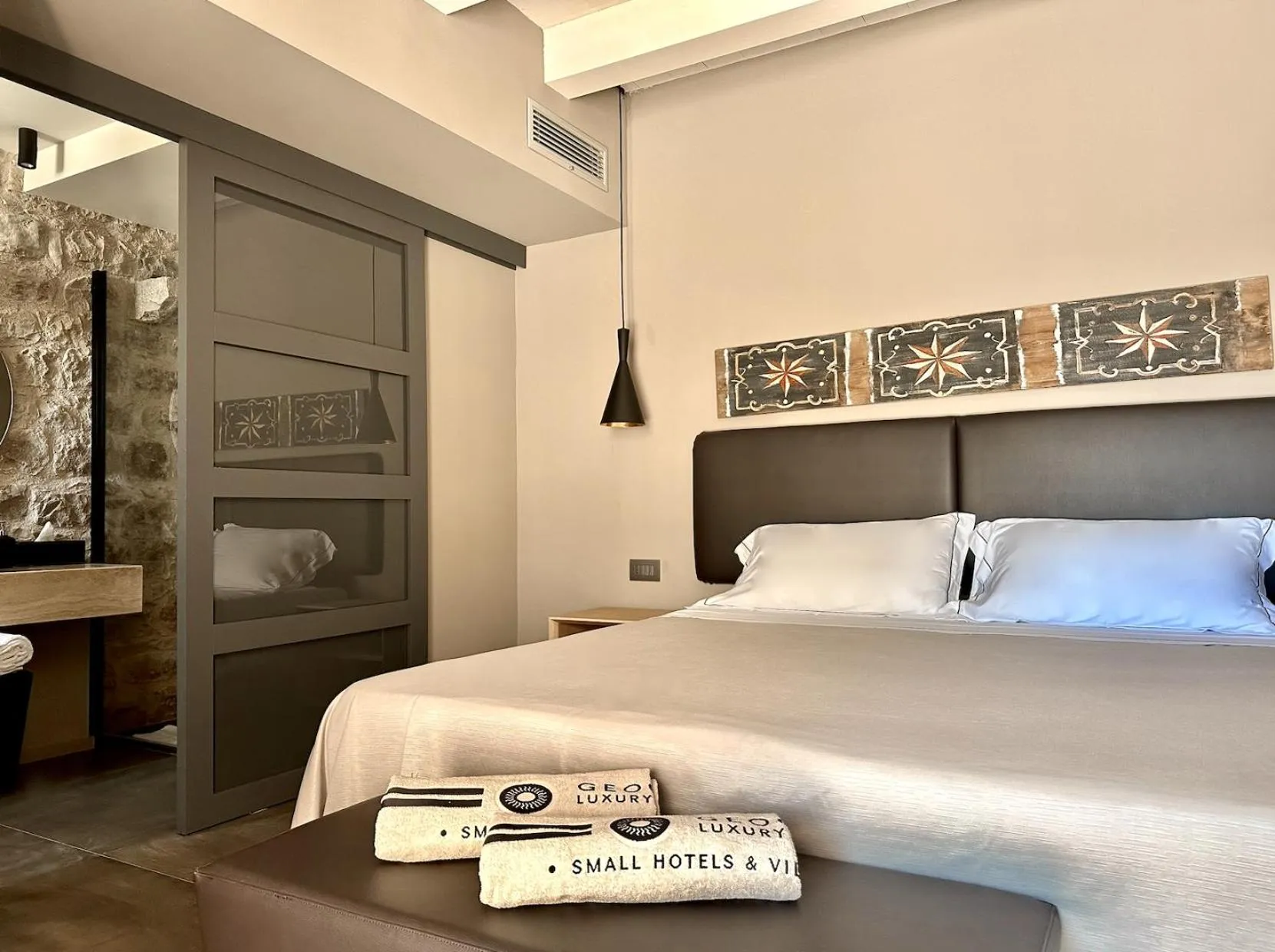 Photo of the whole room, Bed in Pietra d'Acqua Resort & Spa by Geocharme