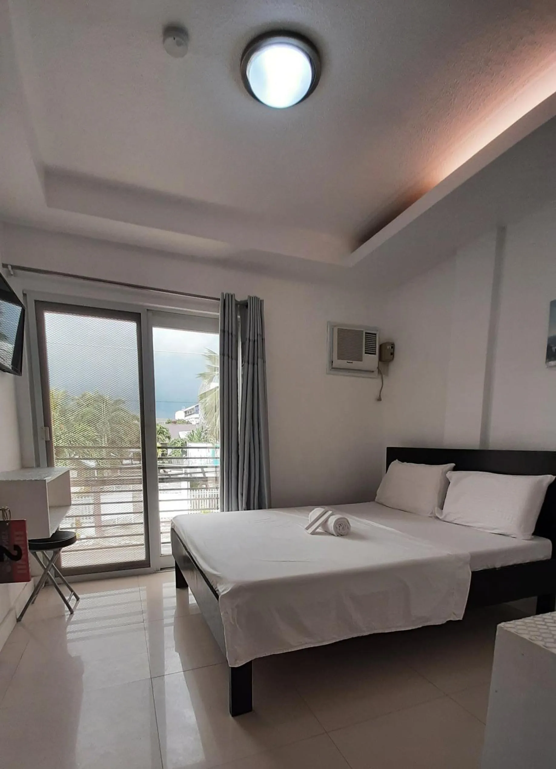 Bed in Livewire Planet Suites