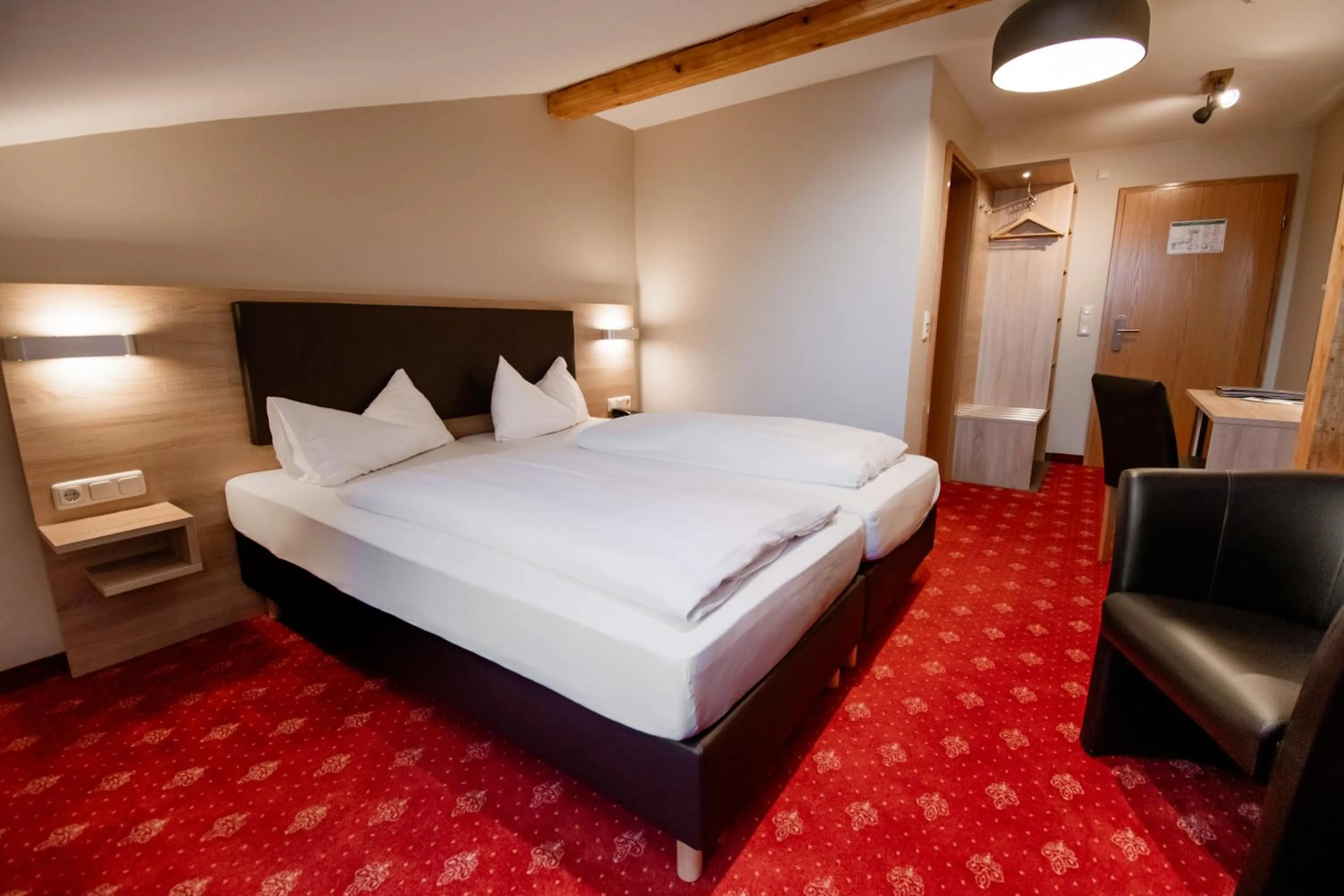 Photo of the whole room, Bed in Hotel Pockinger Hof