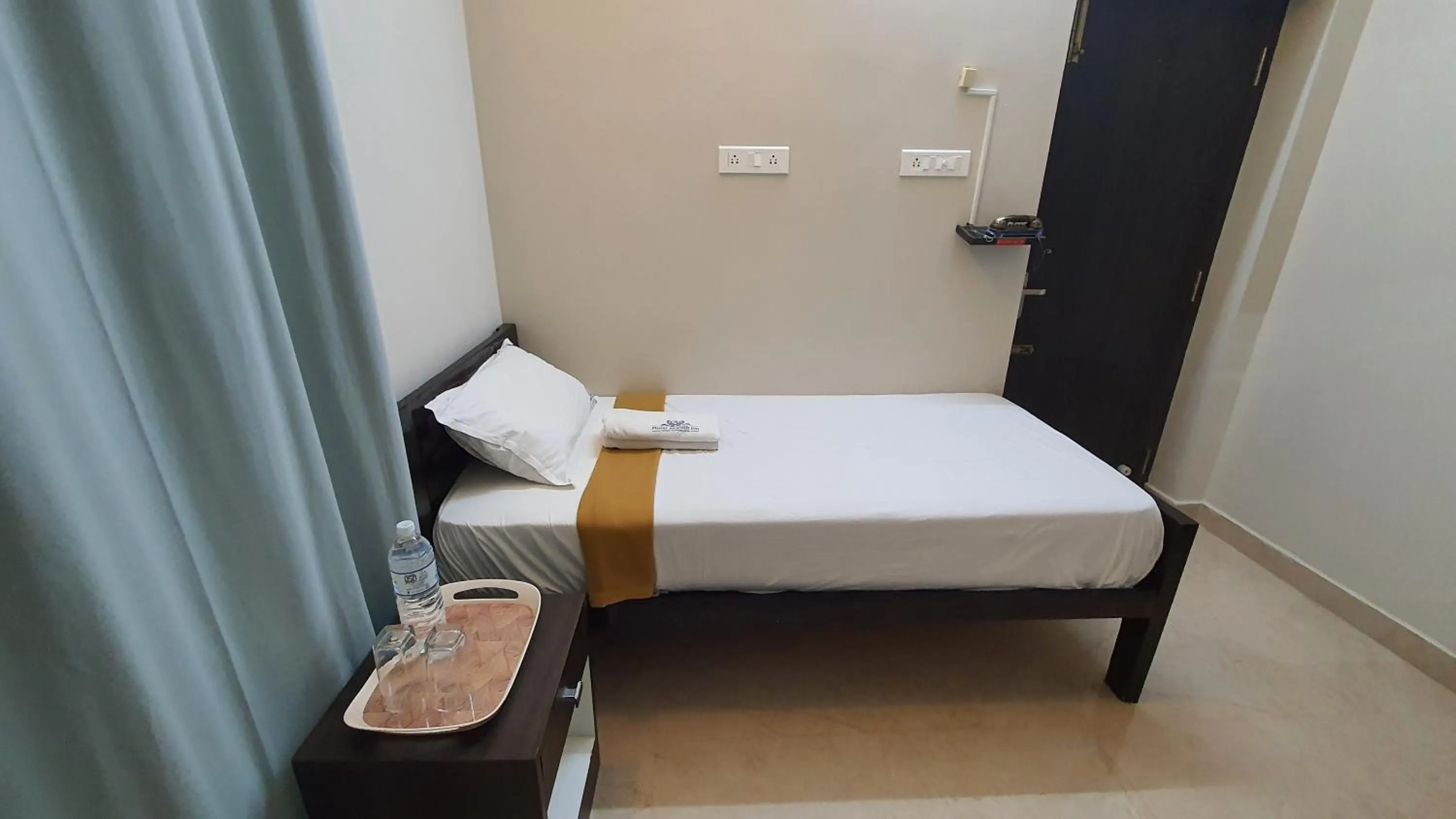 Bed in Hotel Akshith Inn