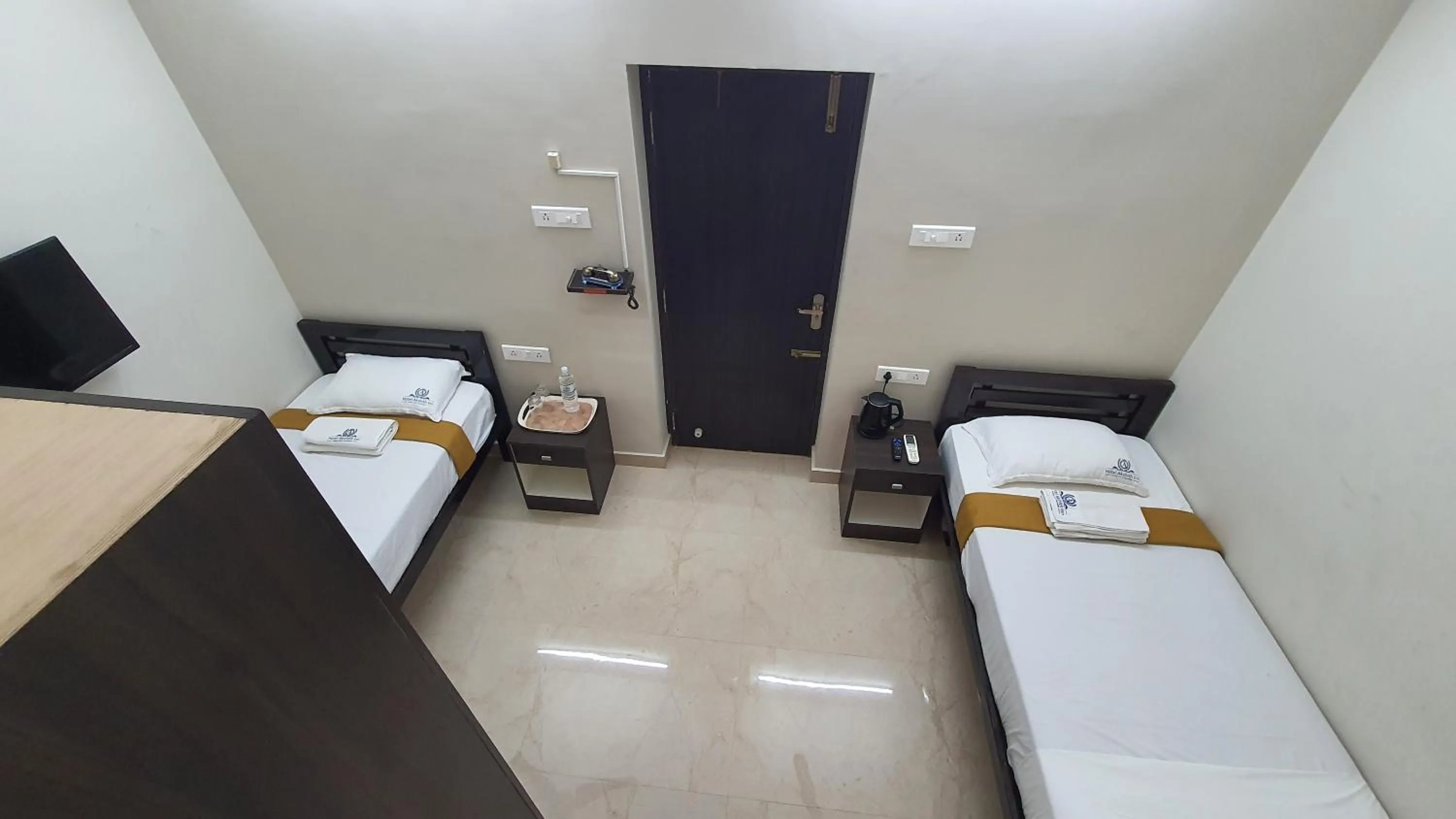 Bed in Hotel Akshith Inn