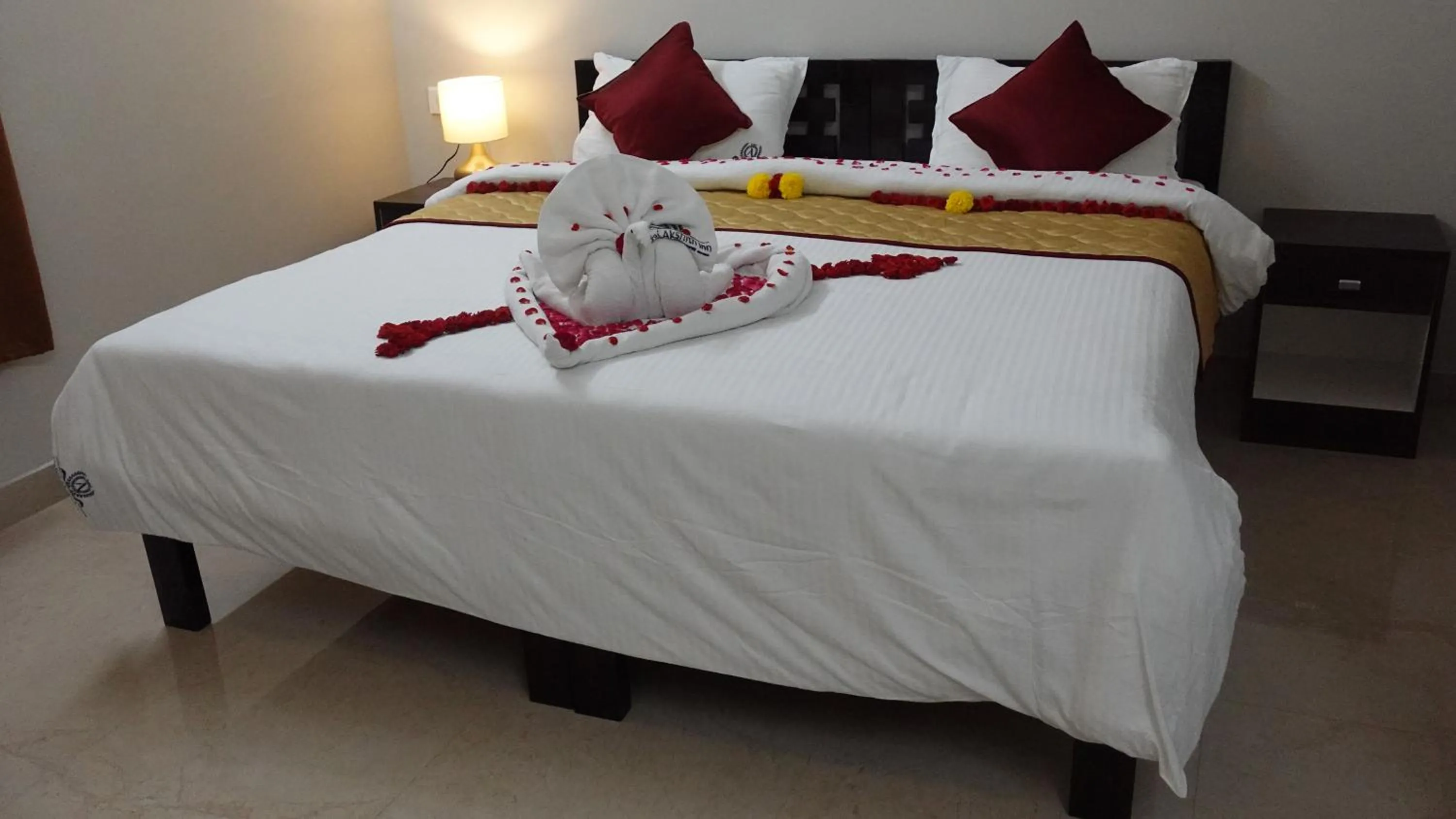 Bed in Hotel Akshith Inn