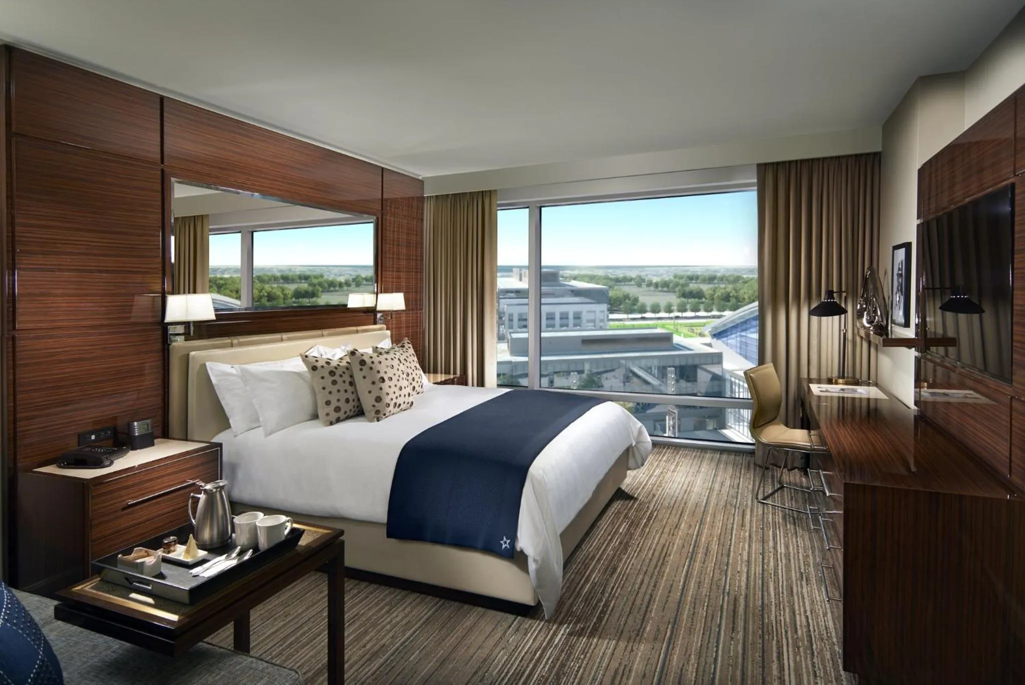Photo of the whole room, Bed in Omni Frisco at The Star