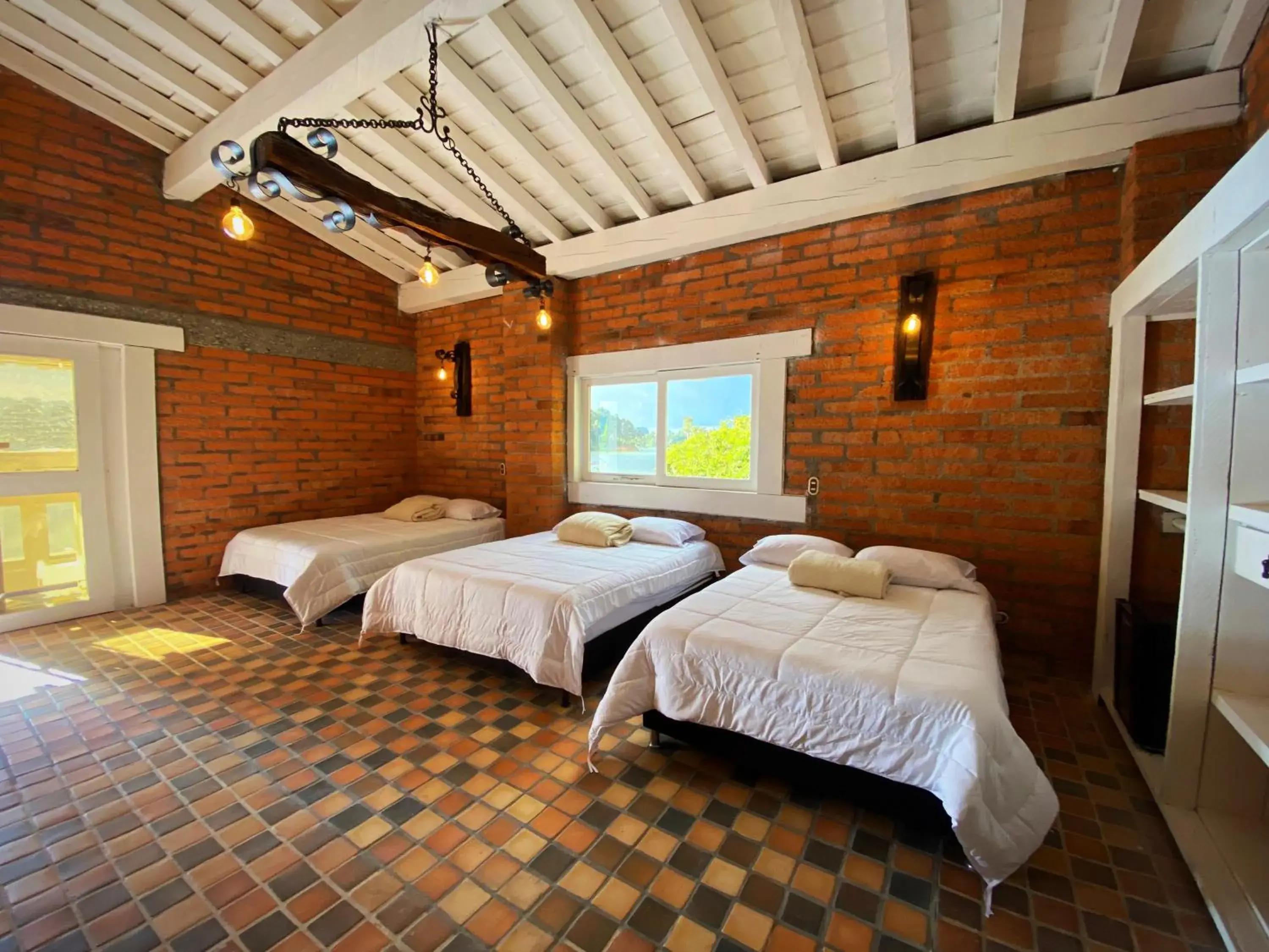 Triple Room with Lake View in Botánico Finca Boutique Guatapé Triple Room with Lake View in Botánico Finca Boutique Guatapé