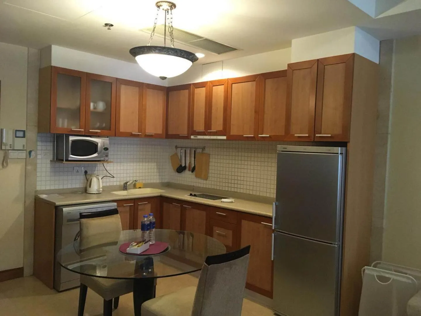 Kitchen or kitchenette in Dalian Asia Pacific Service Apartment (Former Somerset Harbour Court Dalian)