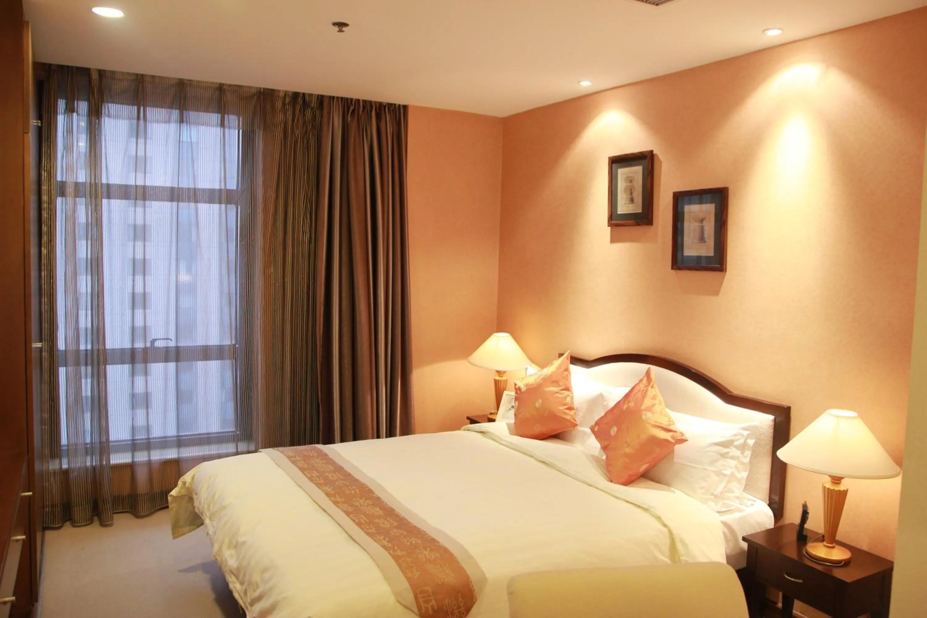 Bed in Dalian Asia Pacific Service Apartment (Former Somerset Harbour Court Dalian)