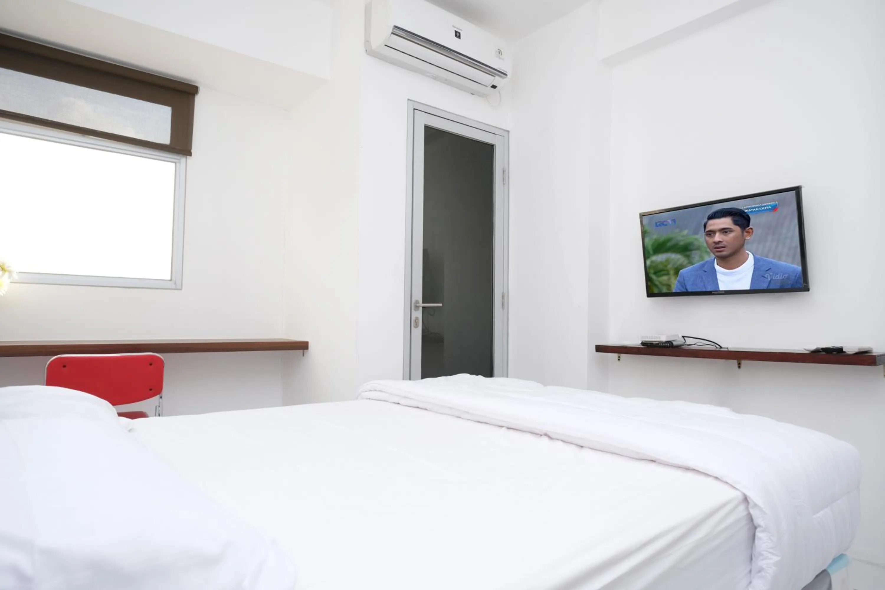 Bedroom in Apartemen Gunung Putri Square by Sirooms