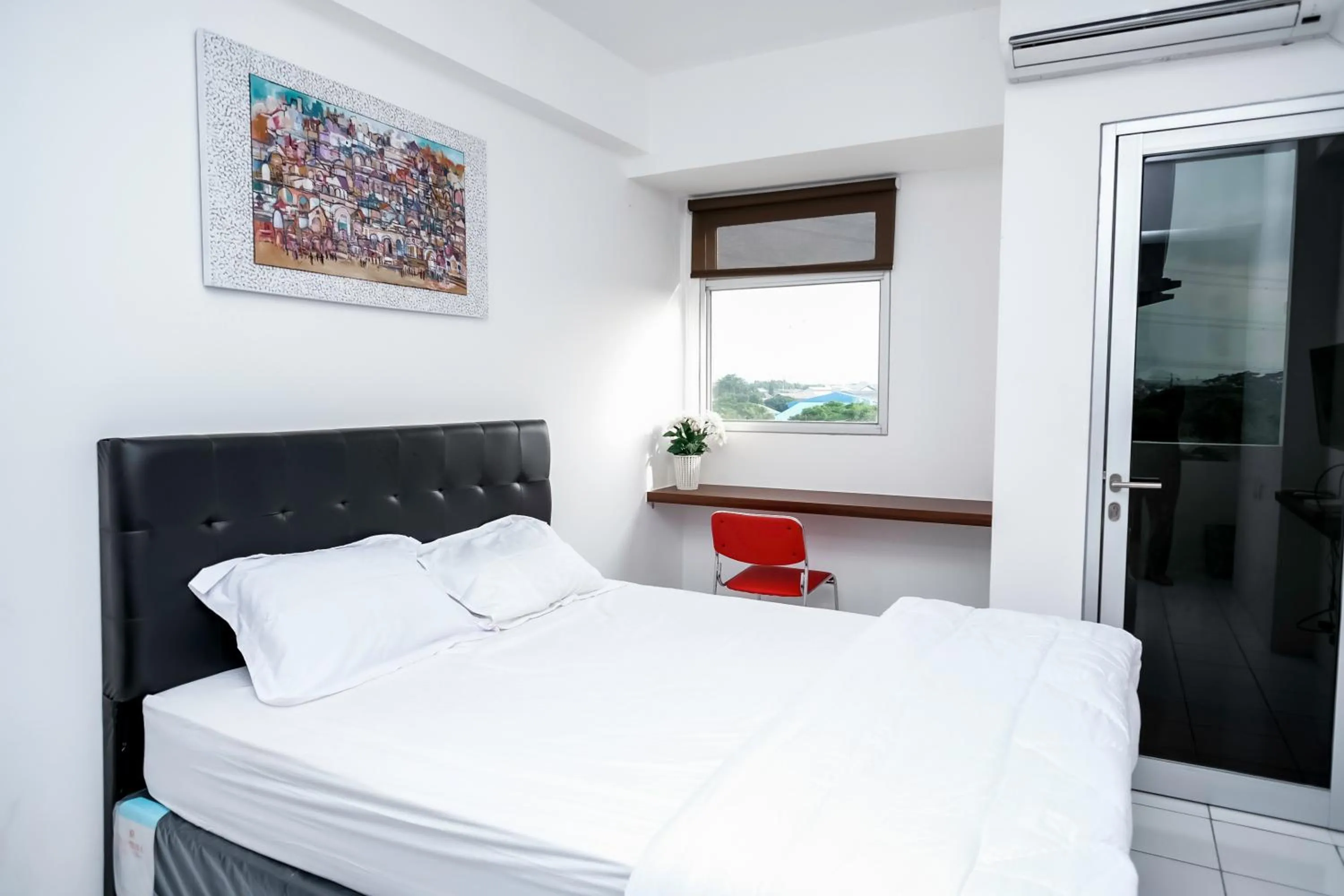 Bedroom in Apartemen Gunung Putri Square by Sirooms