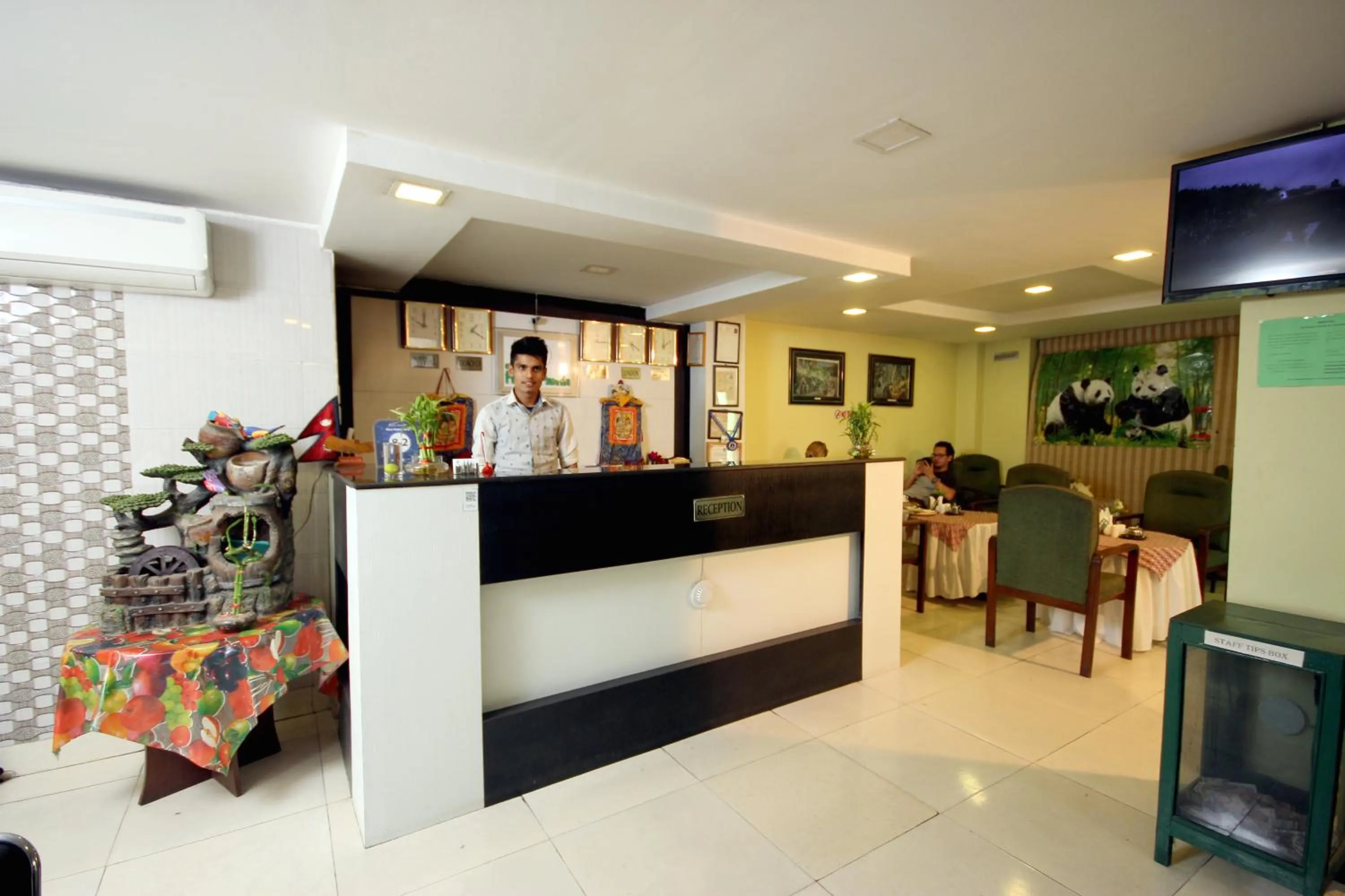 Staff in New Hotel Panda