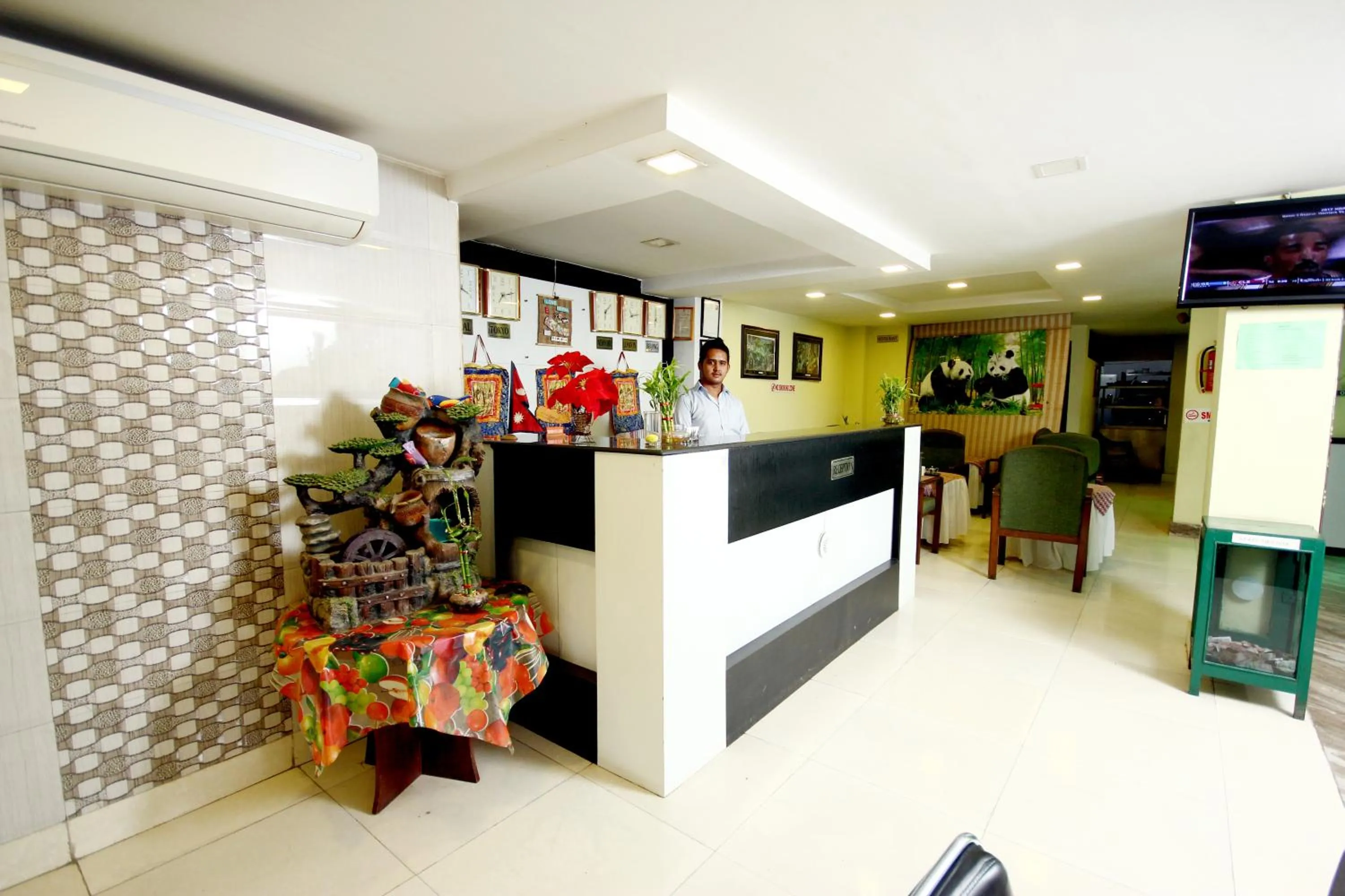 Staff in New Hotel Panda