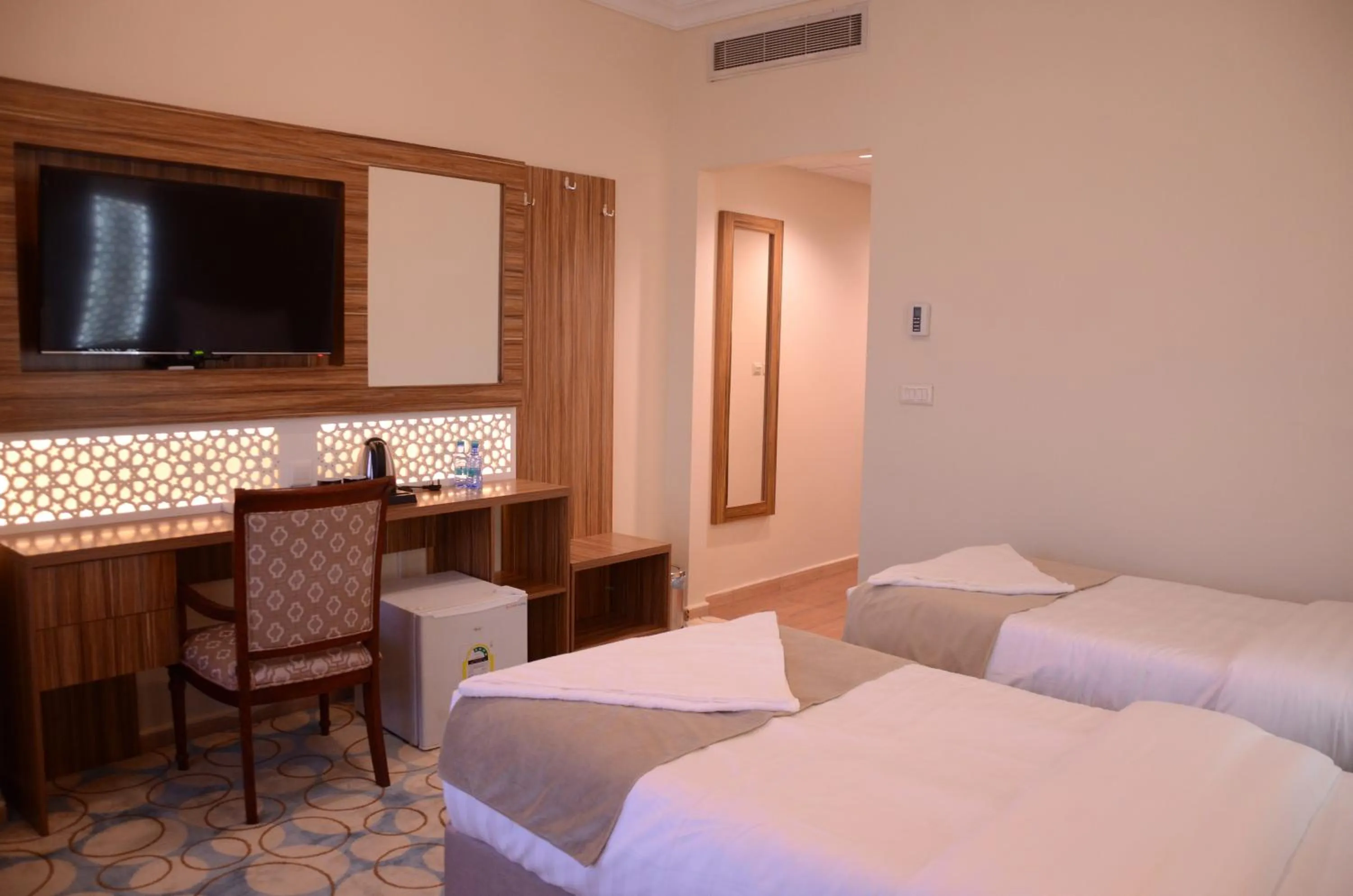 Photo of the whole room, Bed in Artal Al Alami Hotel