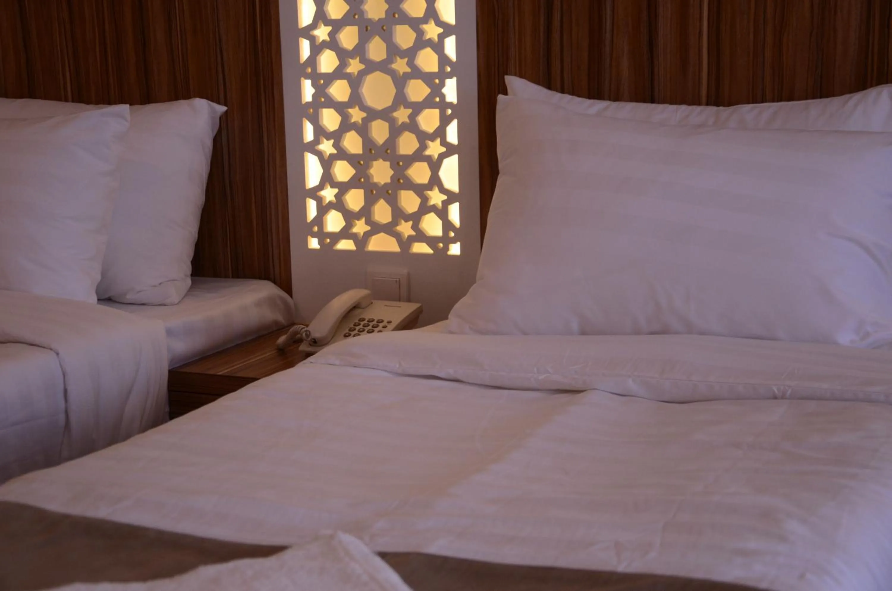 Bed in Artal Al Alami Hotel