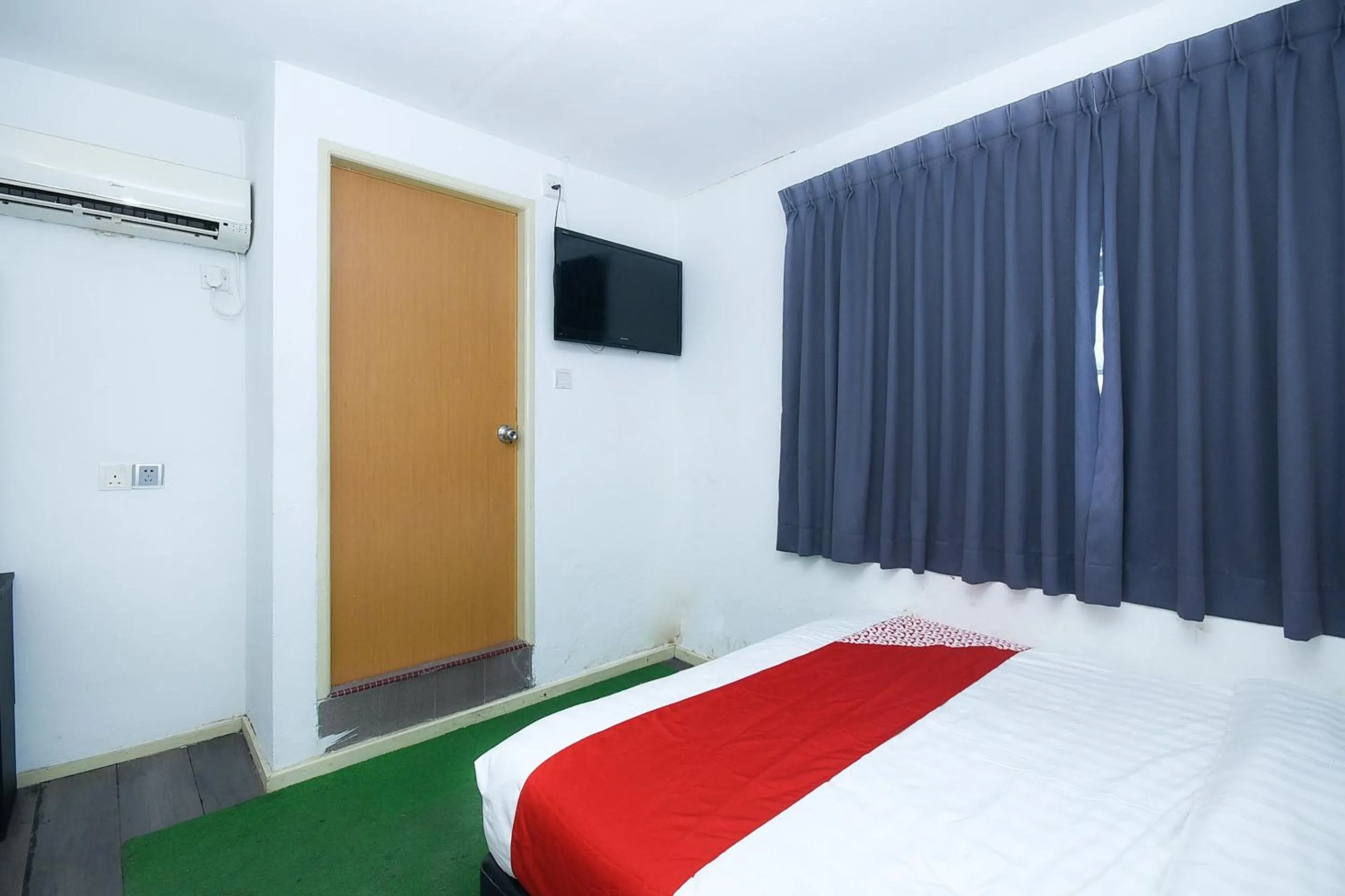 Bedroom in Hotel O River Inn