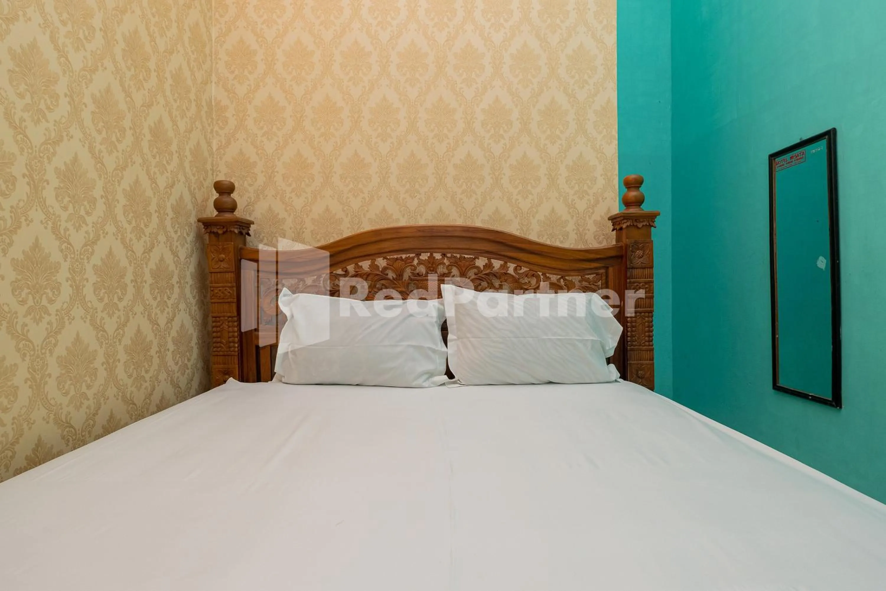 Bed in Hotel Wisata Ziarah Sunan Bonang Syariah Mitra RedDoorz