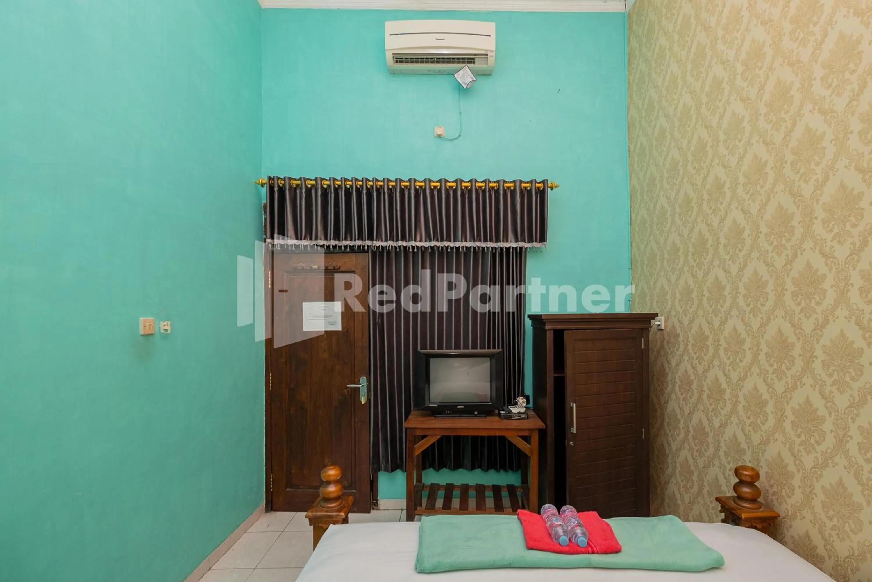 Bed in Hotel Wisata Ziarah Sunan Bonang Syariah Mitra RedDoorz