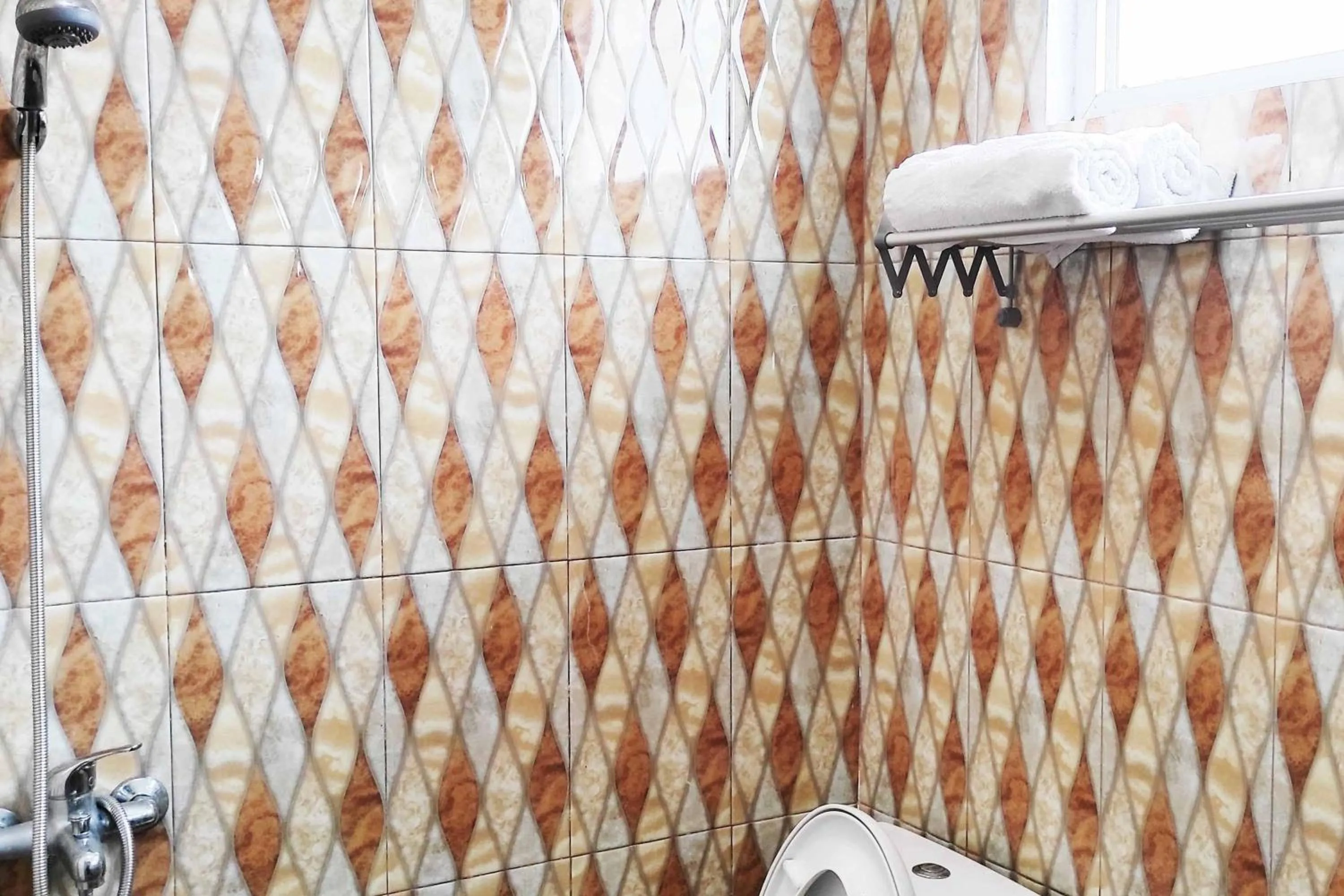 Bathroom in Pertiwi Homestay Near Museum Angkut Batu Mitra RedDoorz