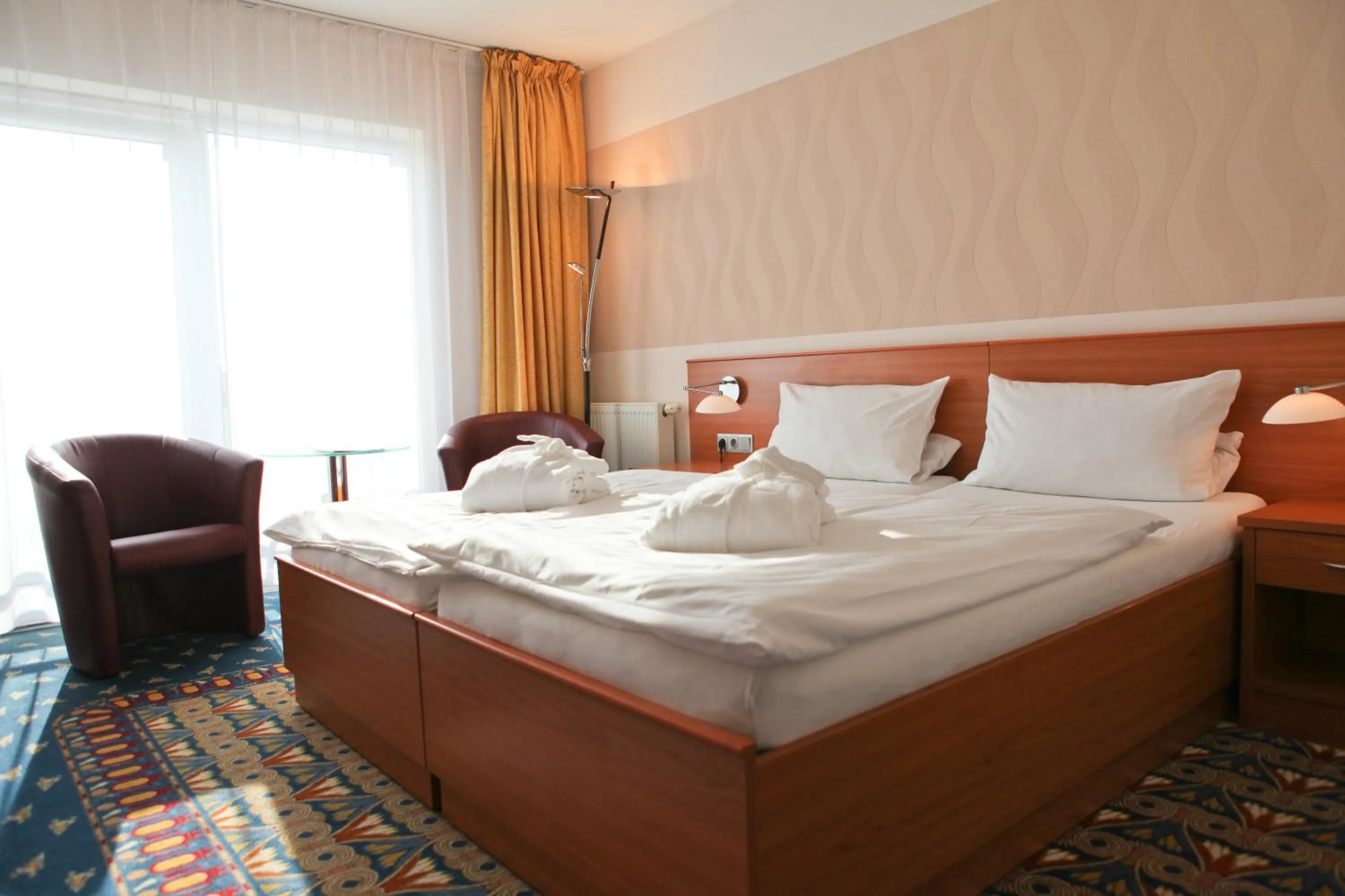 Photo of the whole room, Bed in Kurhotel Pyramide Bad Windsheim