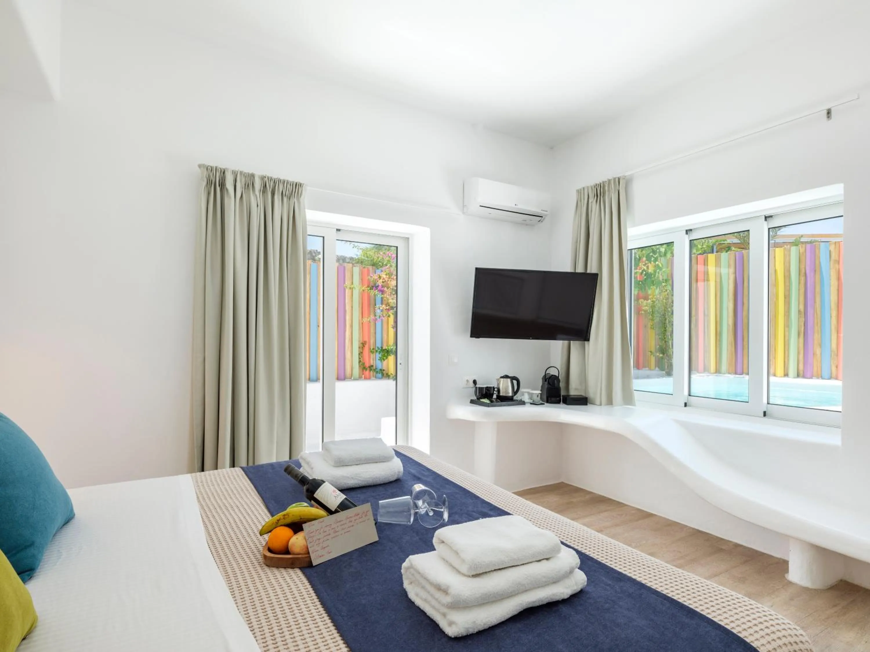 Communal lounge/ TV room, Bed in Akkadian LGBT Boutique Hotel