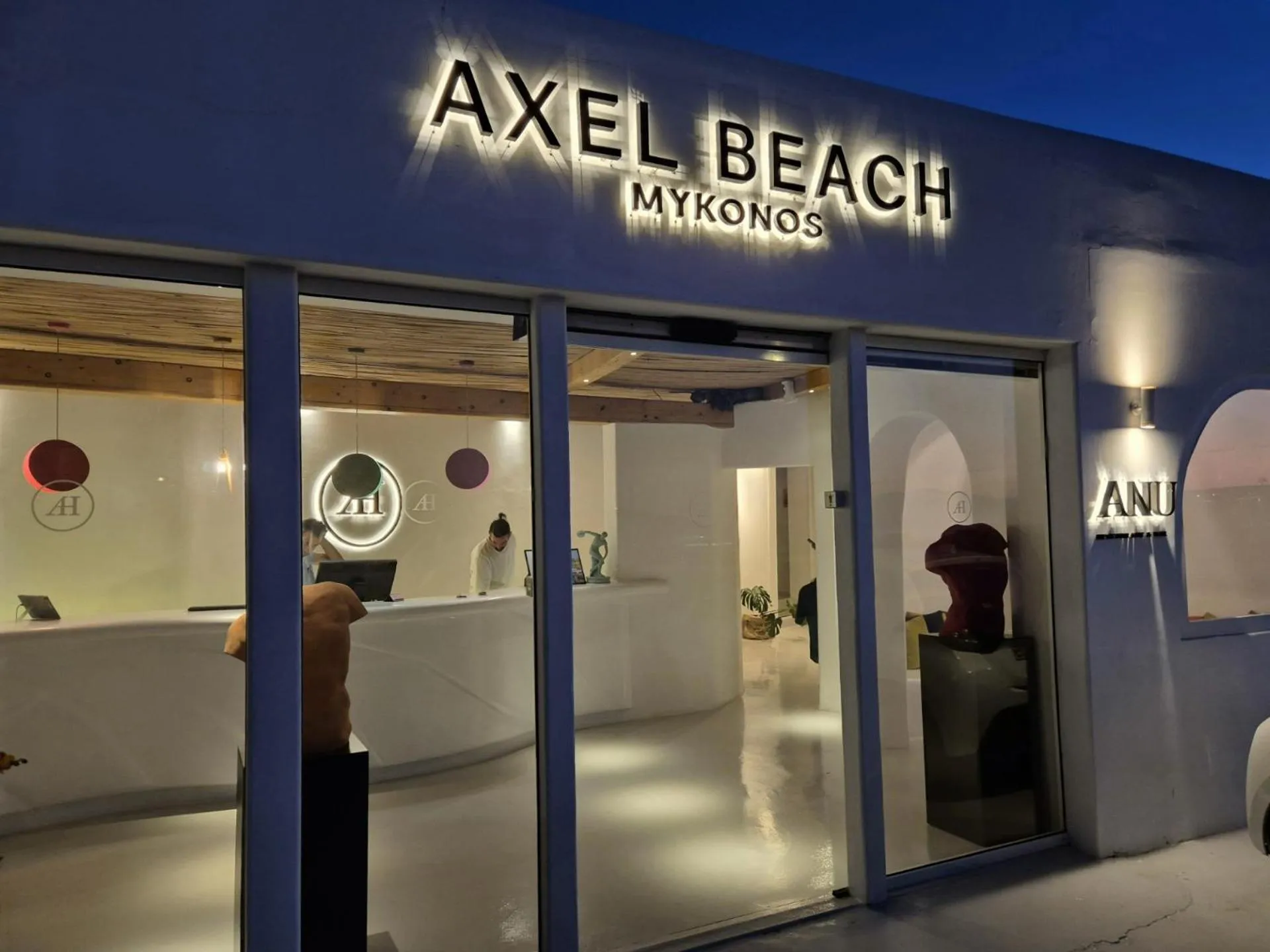 Text overlay in Axel Beach Mykonos - Adults Only