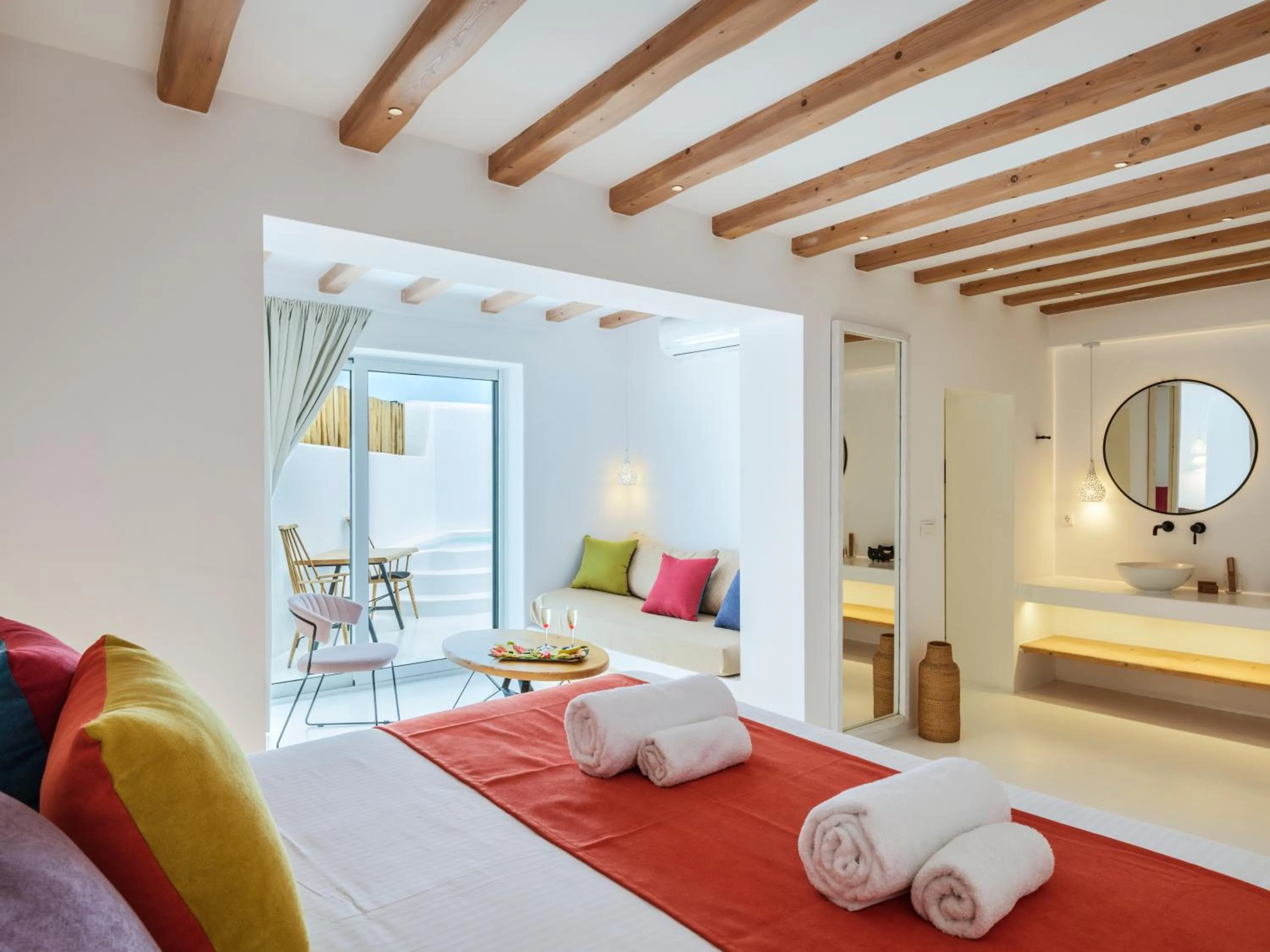 Communal lounge/ TV room, Bed in Akkadian LGBT Boutique Hotel