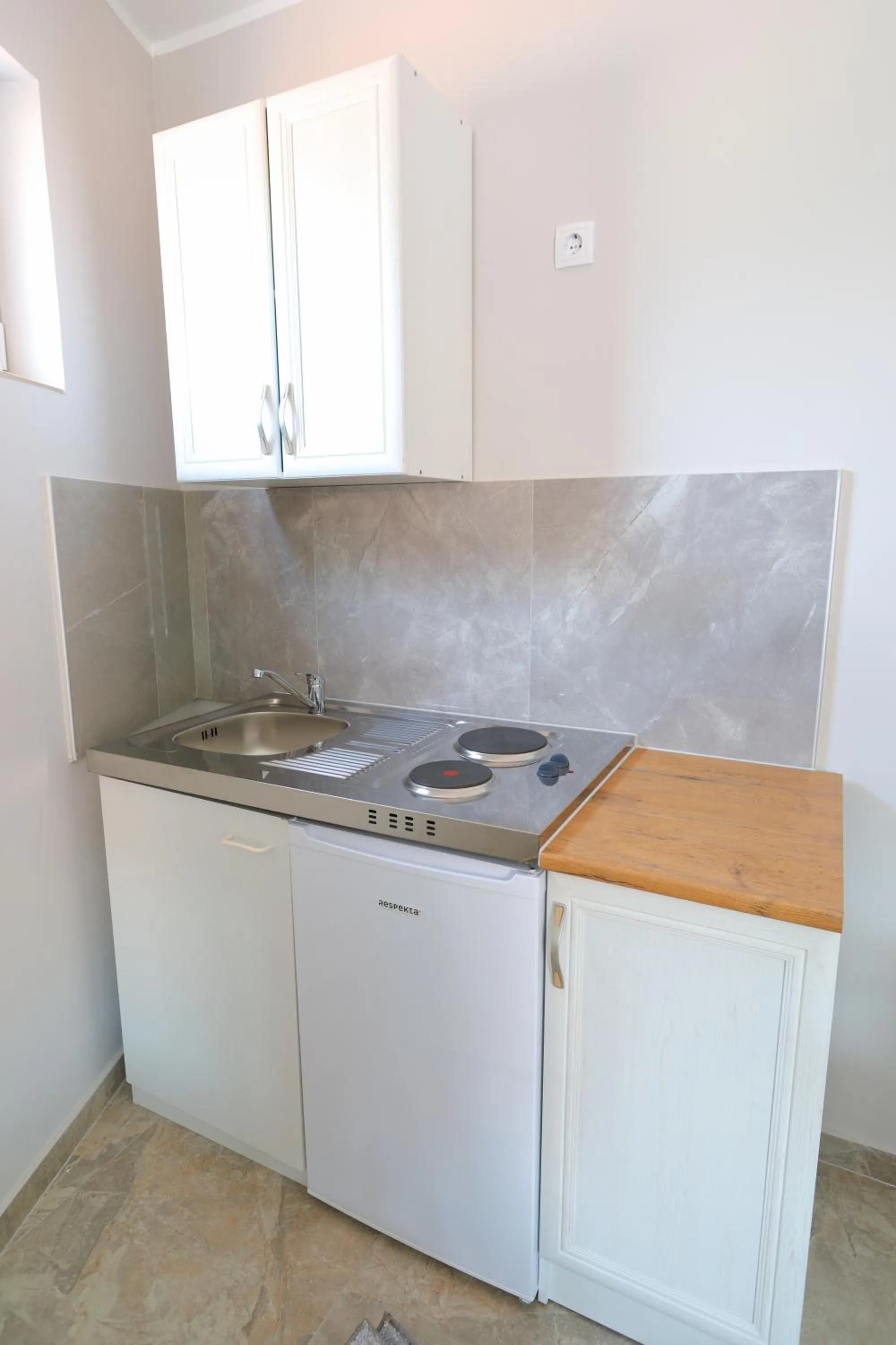 Kitchen or kitchenette in Fenix Apartments