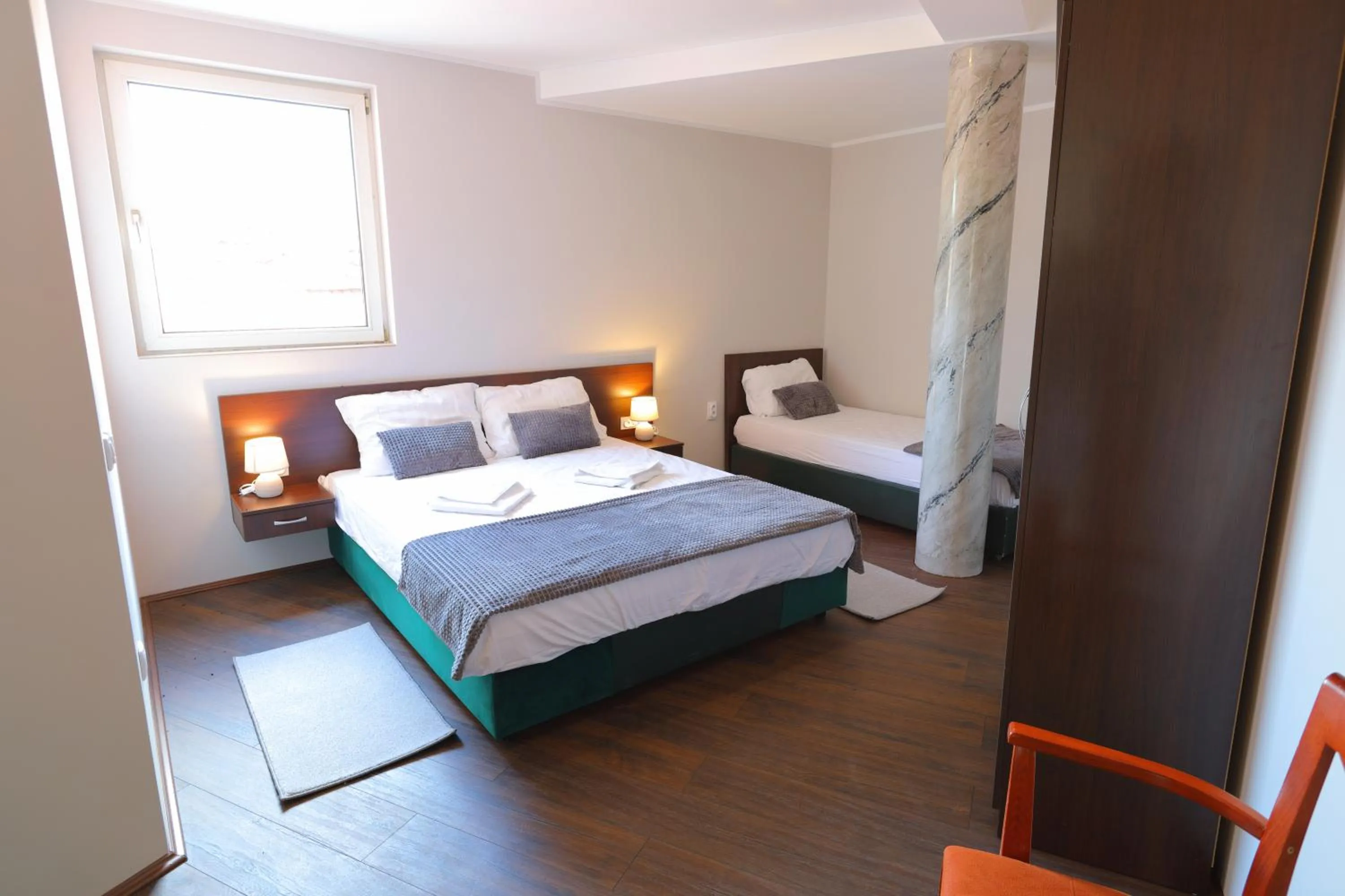 Bed in Fenix Apartments