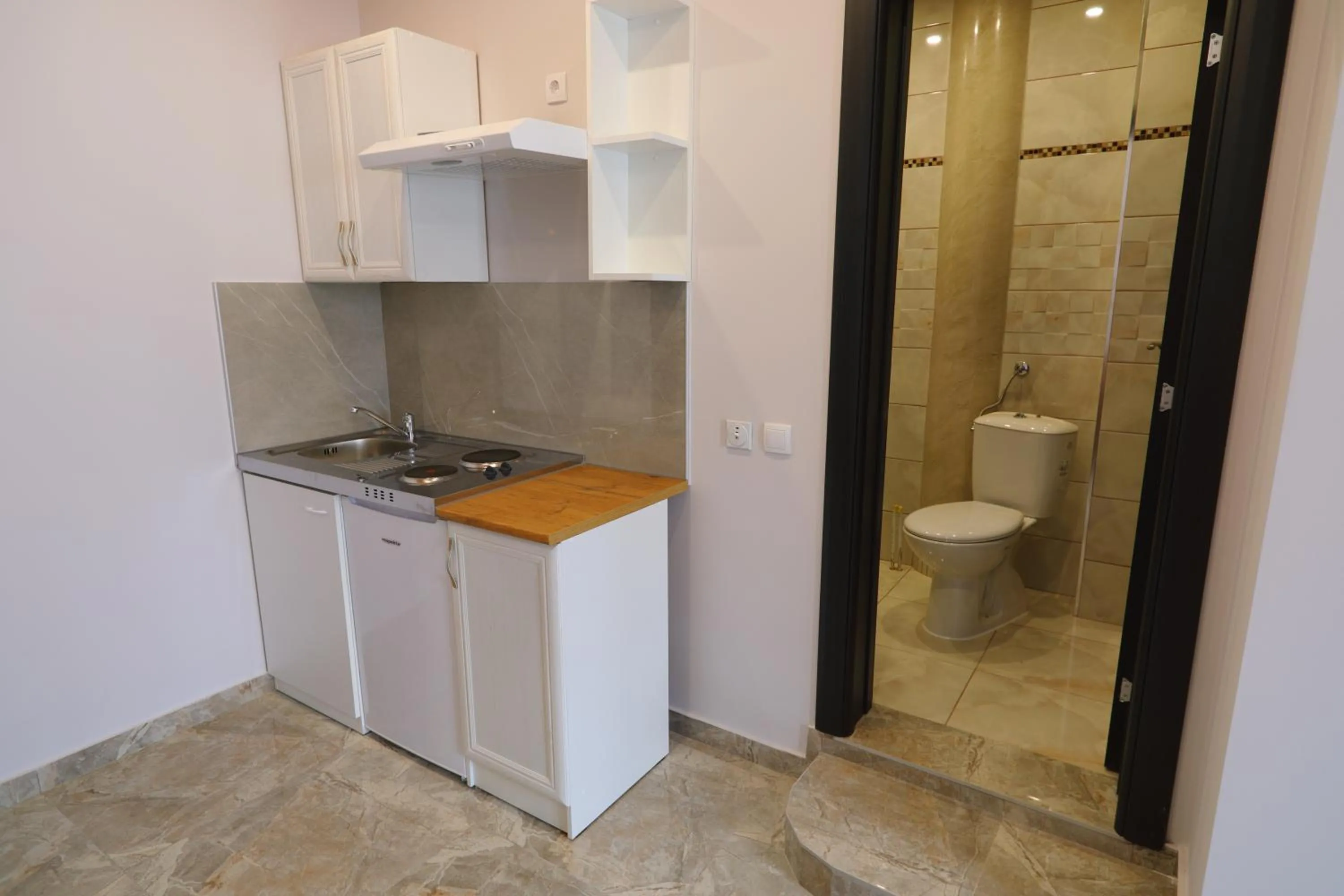 Kitchen or kitchenette in Fenix Apartments