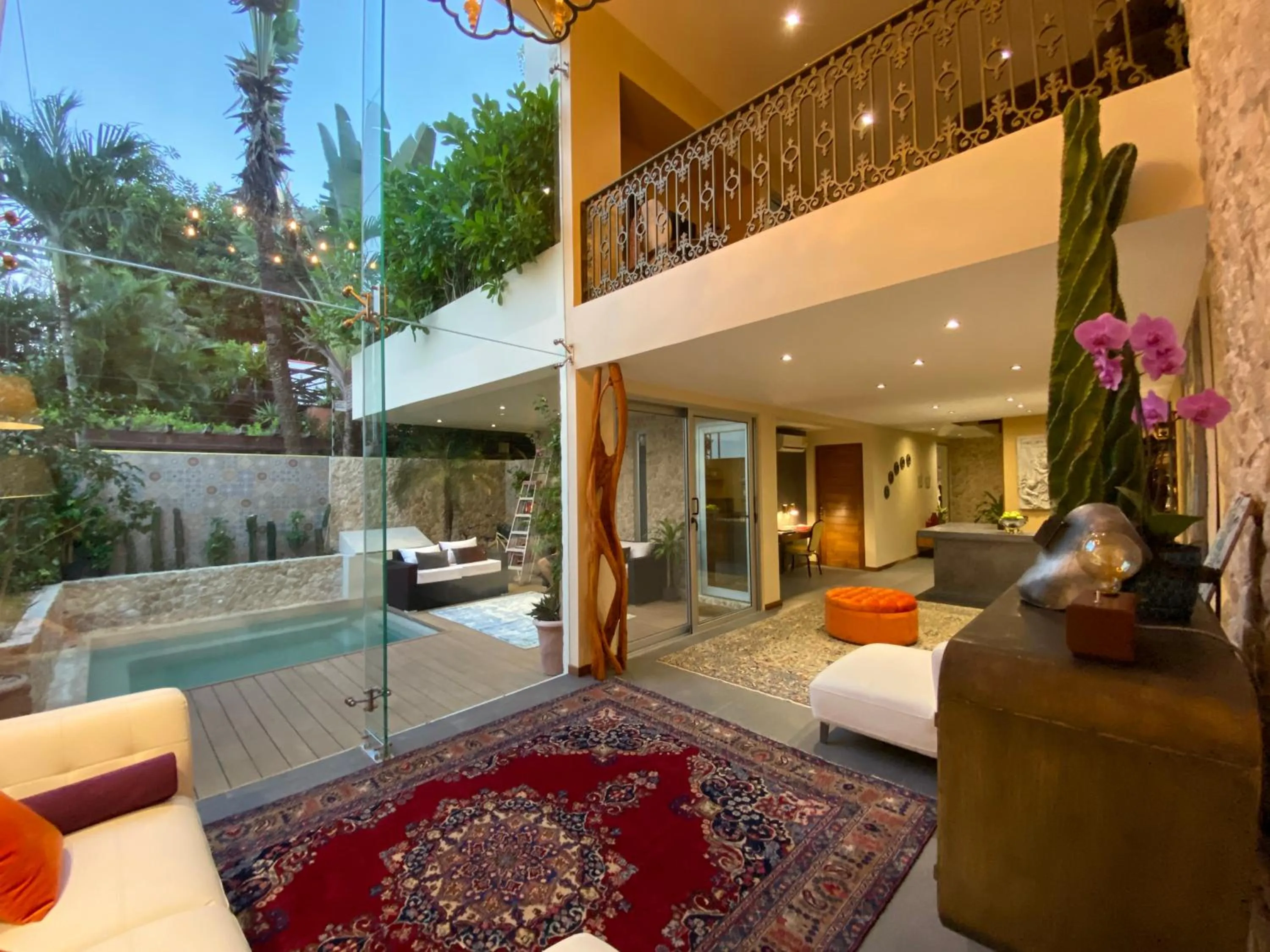 Communal lounge/ TV room in Casarte Boutique Hotel