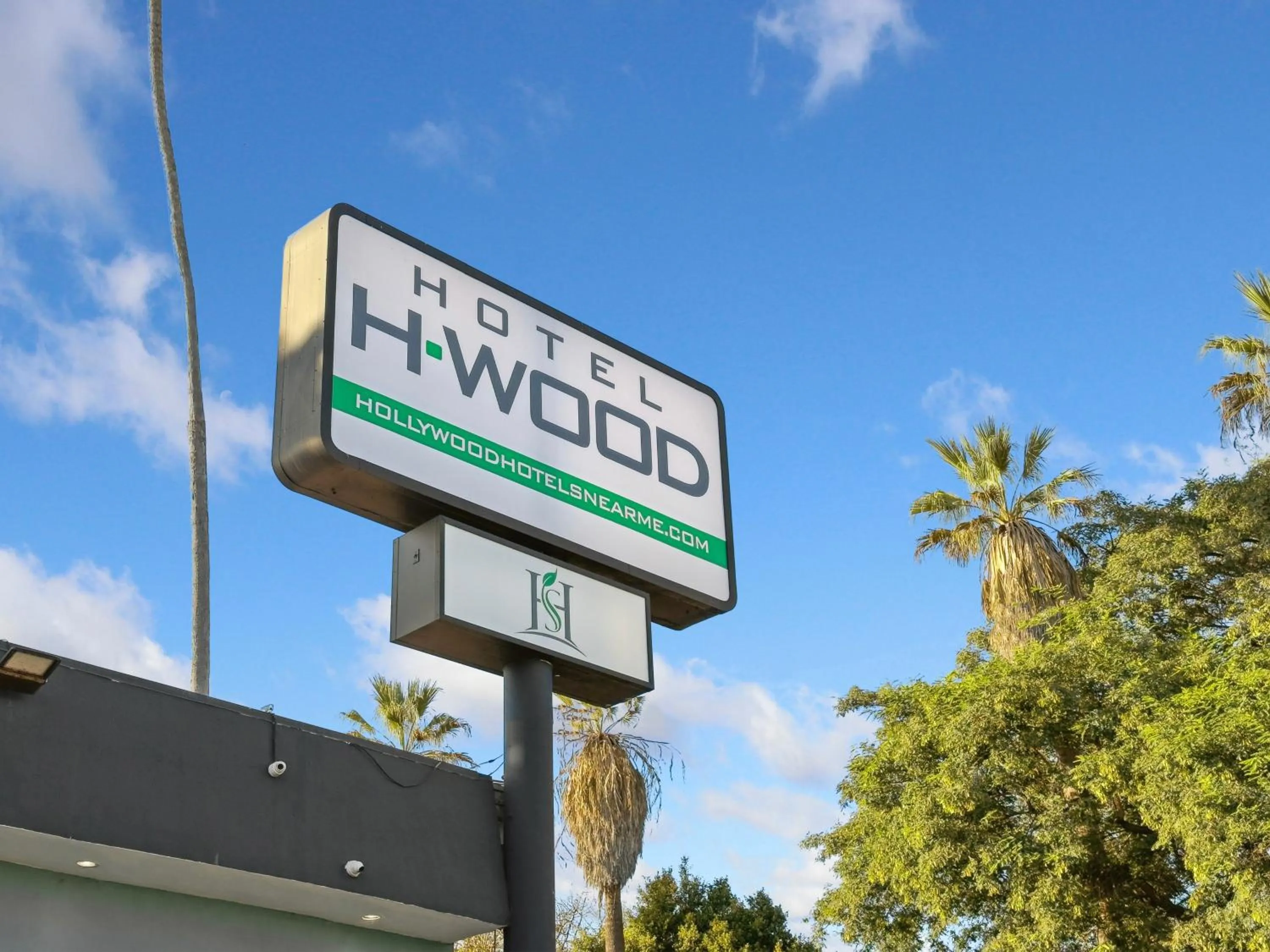 Property logo or sign in Hotel H-Wood