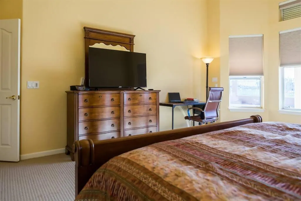 Bed in Spacious golf course house with pool heater, spa