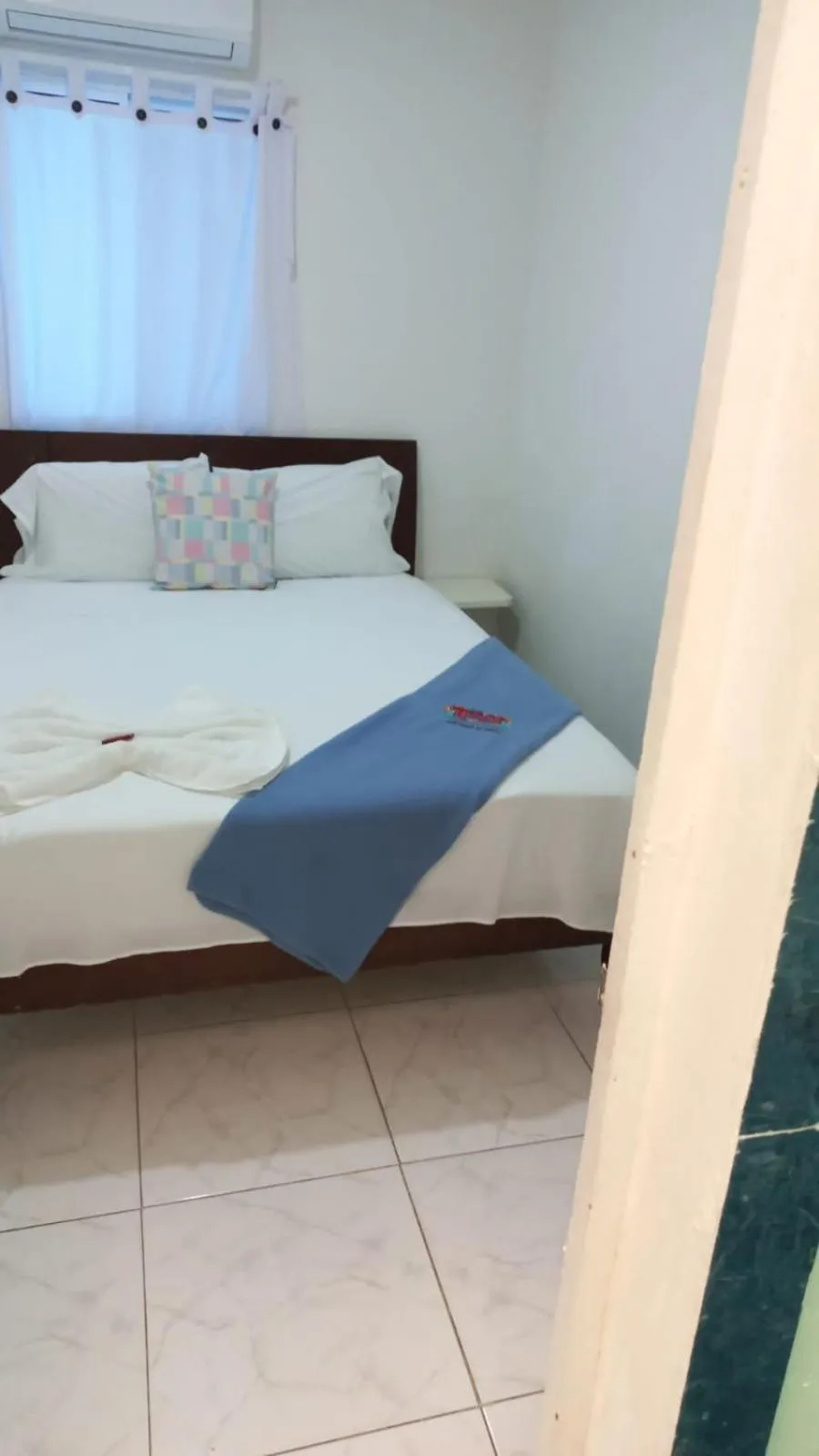 Bed in Tita’s Airport Hotel