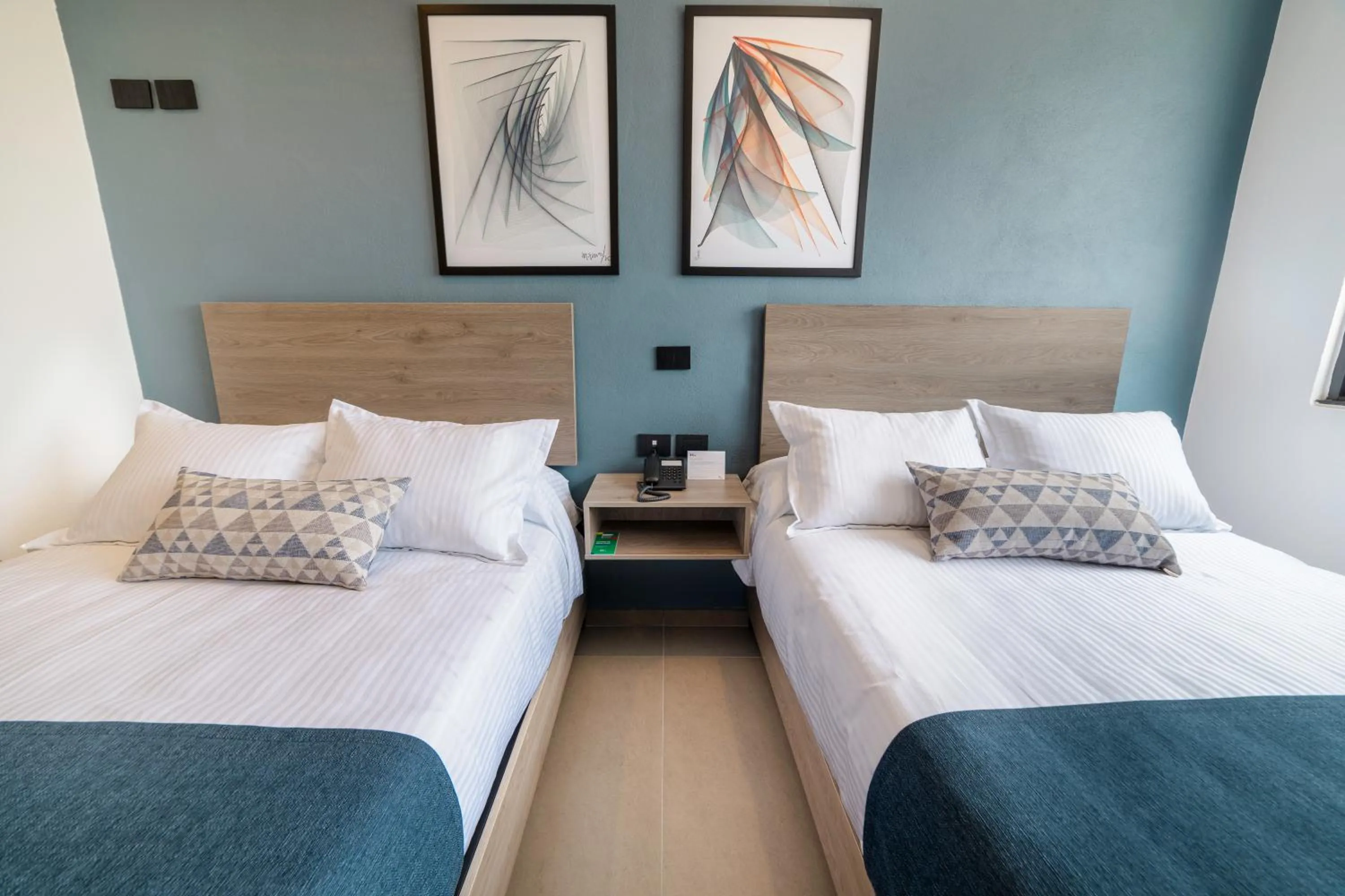 Bed in TH HOTEL & VIVIENDA