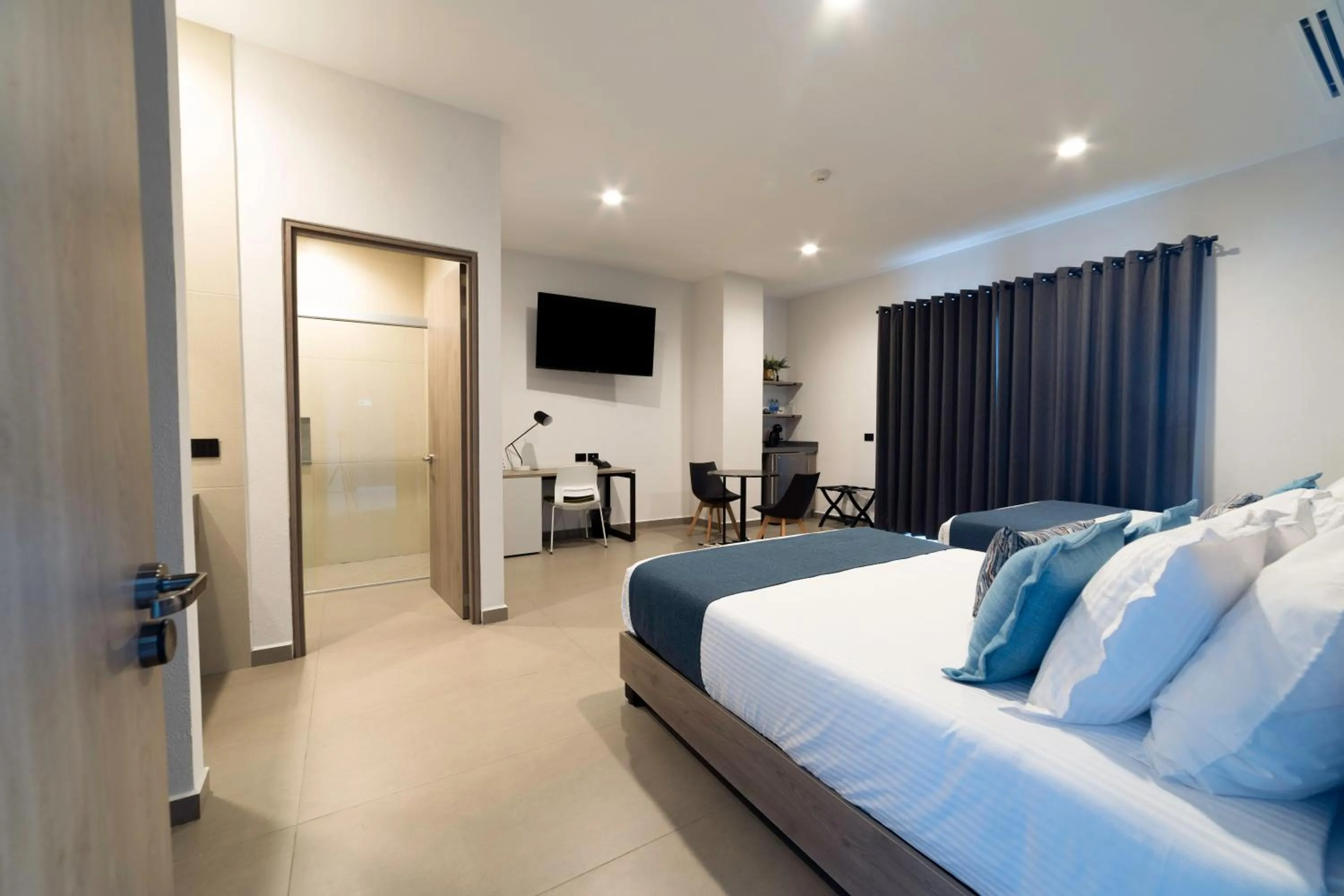 Photo of the whole room, Bed in TH HOTEL & VIVIENDA