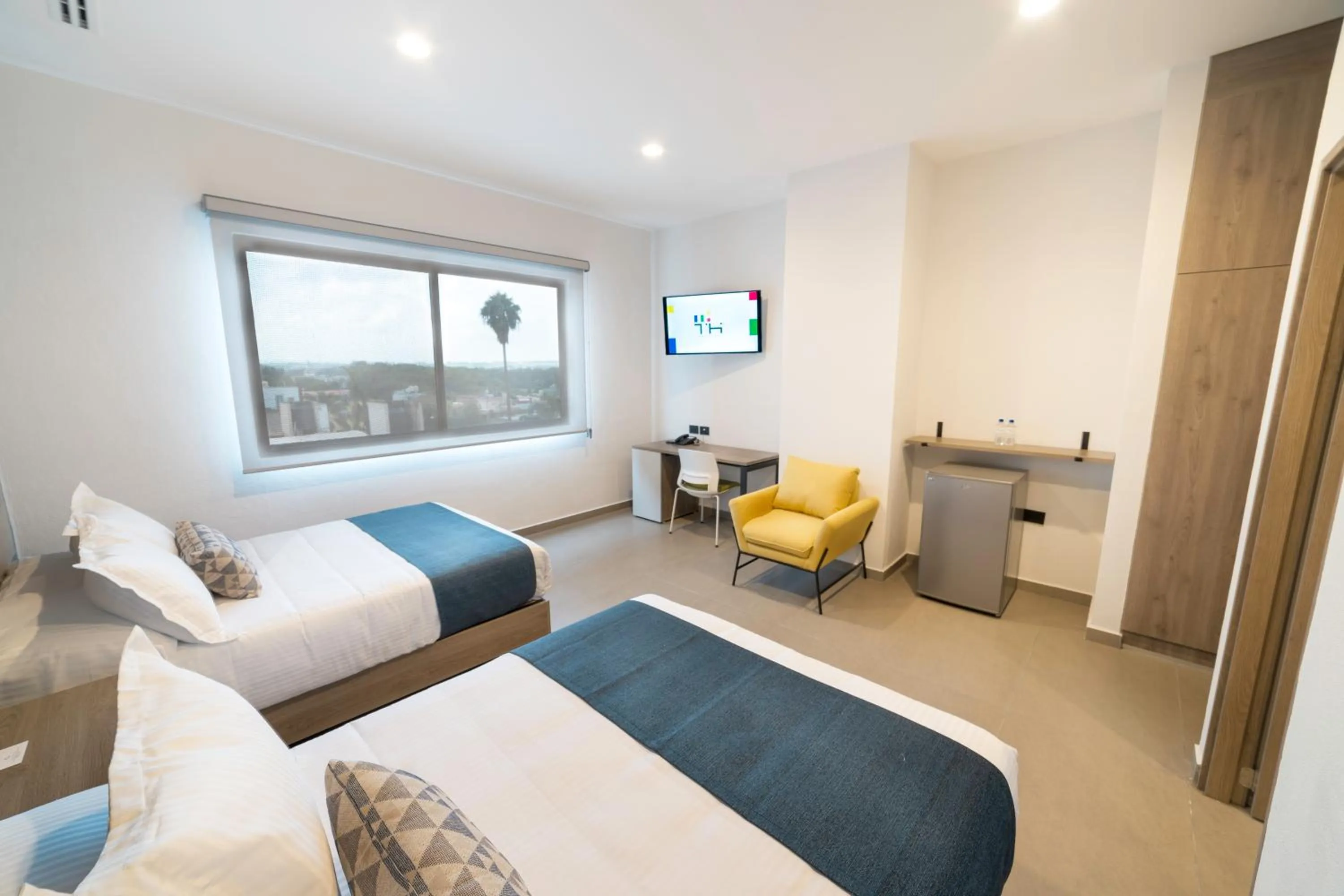 Photo of the whole room, Bed in TH HOTEL & VIVIENDA