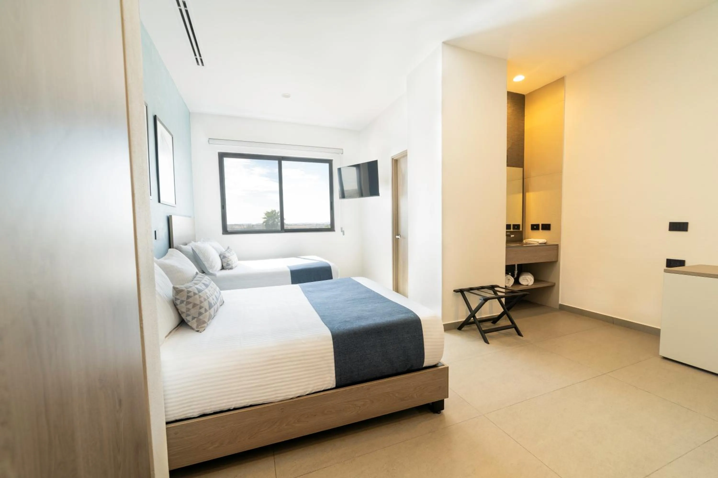 Photo of the whole room, Bed in TH HOTEL & VIVIENDA