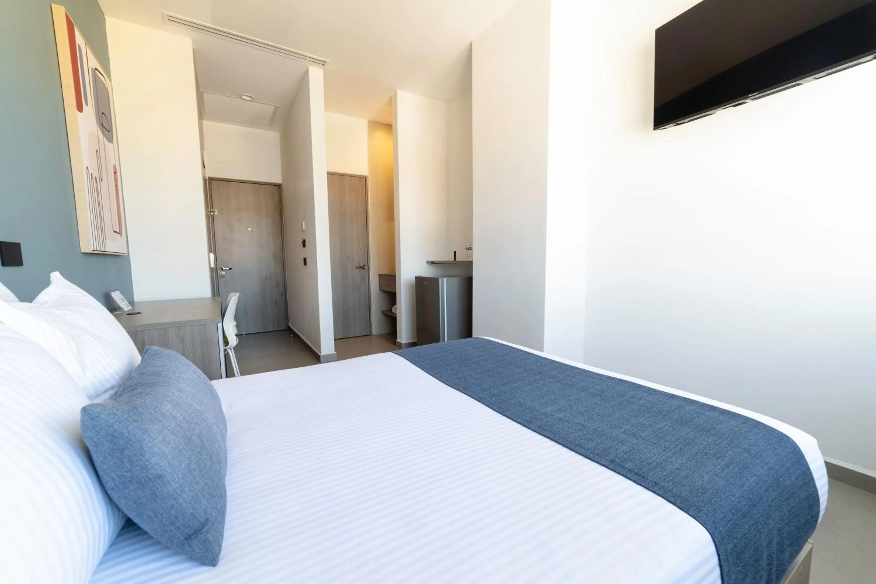 Bed in TH HOTEL & VIVIENDA