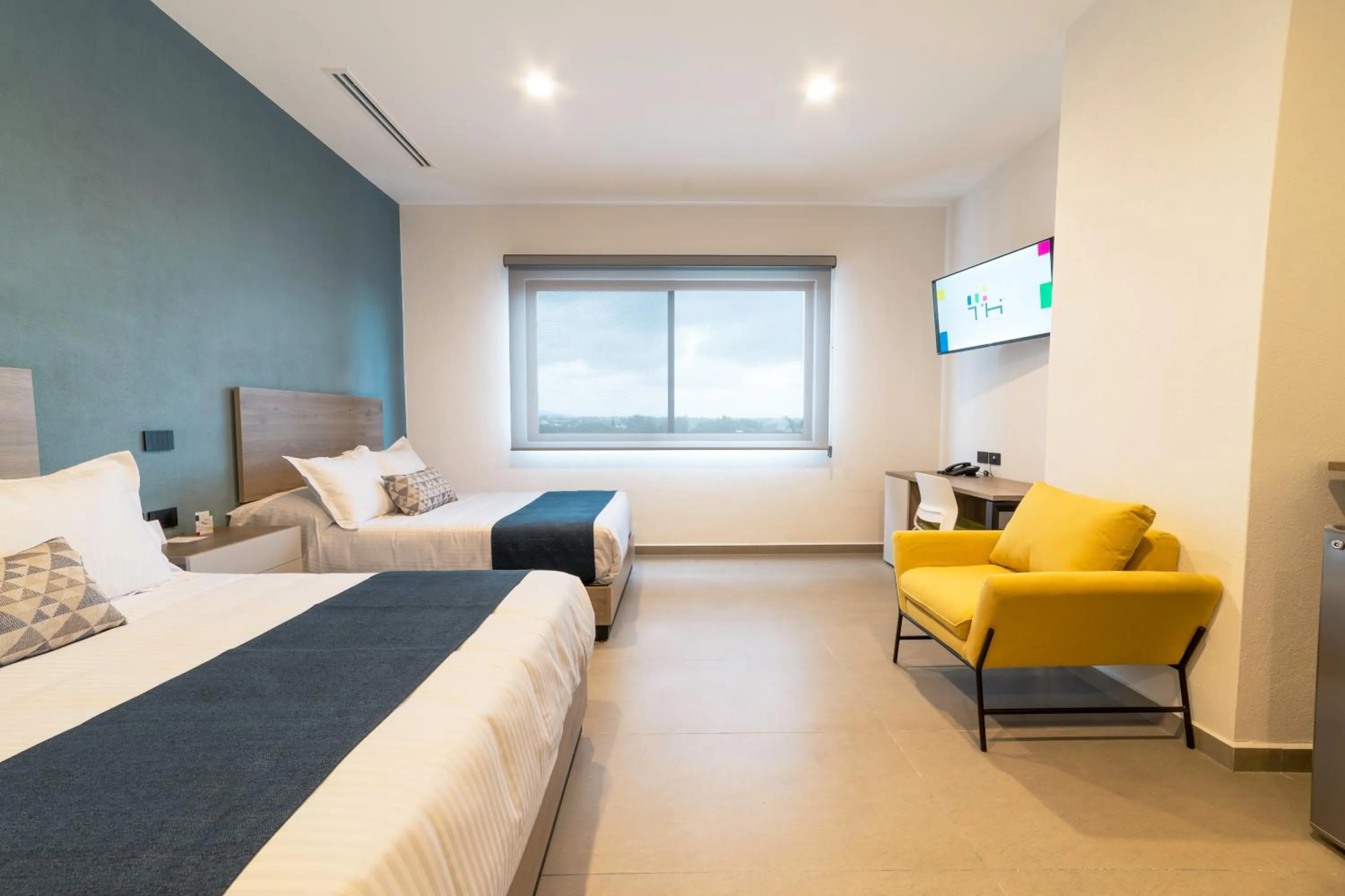 Photo of the whole room, Bed in TH HOTEL & VIVIENDA