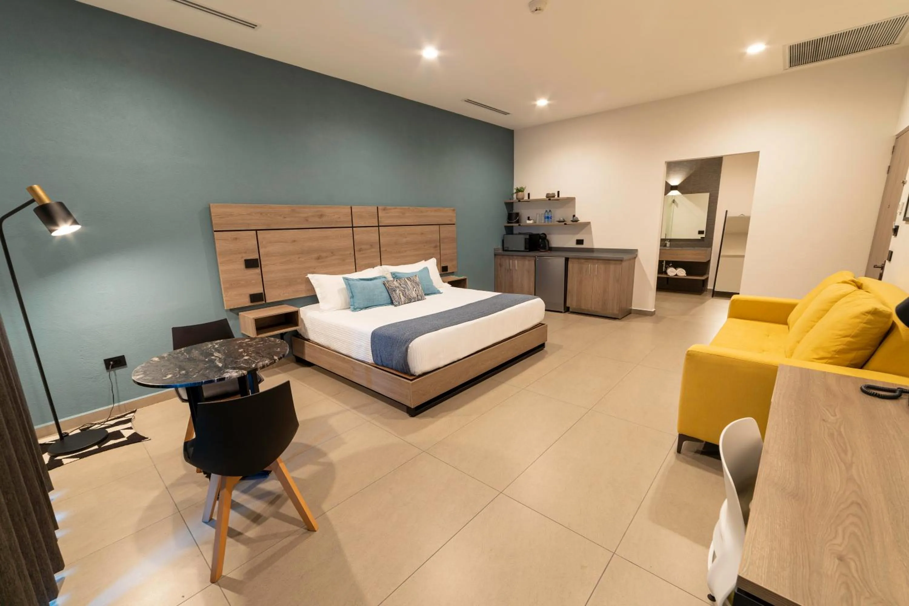 Photo of the whole room, Bed in TH HOTEL & VIVIENDA