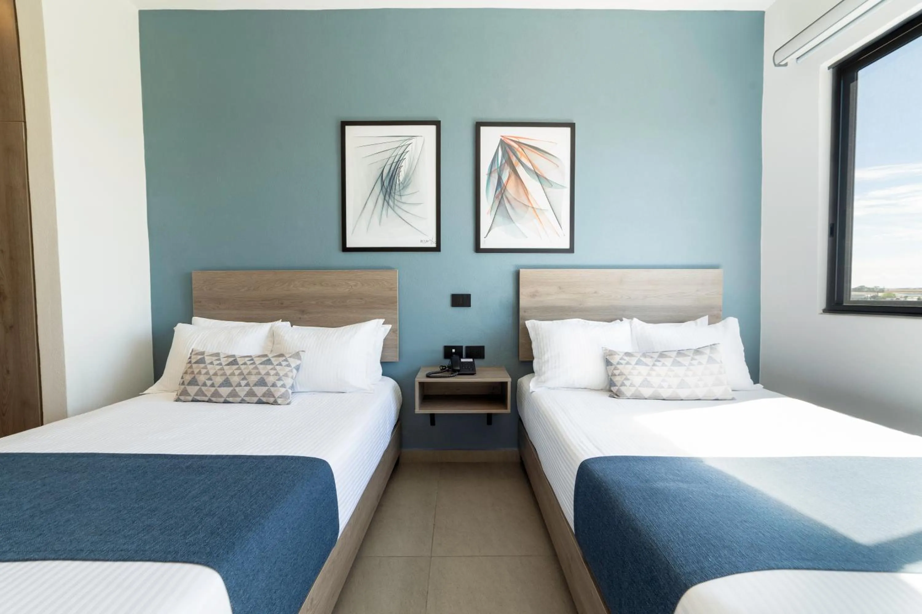 Bed in TH HOTEL & VIVIENDA