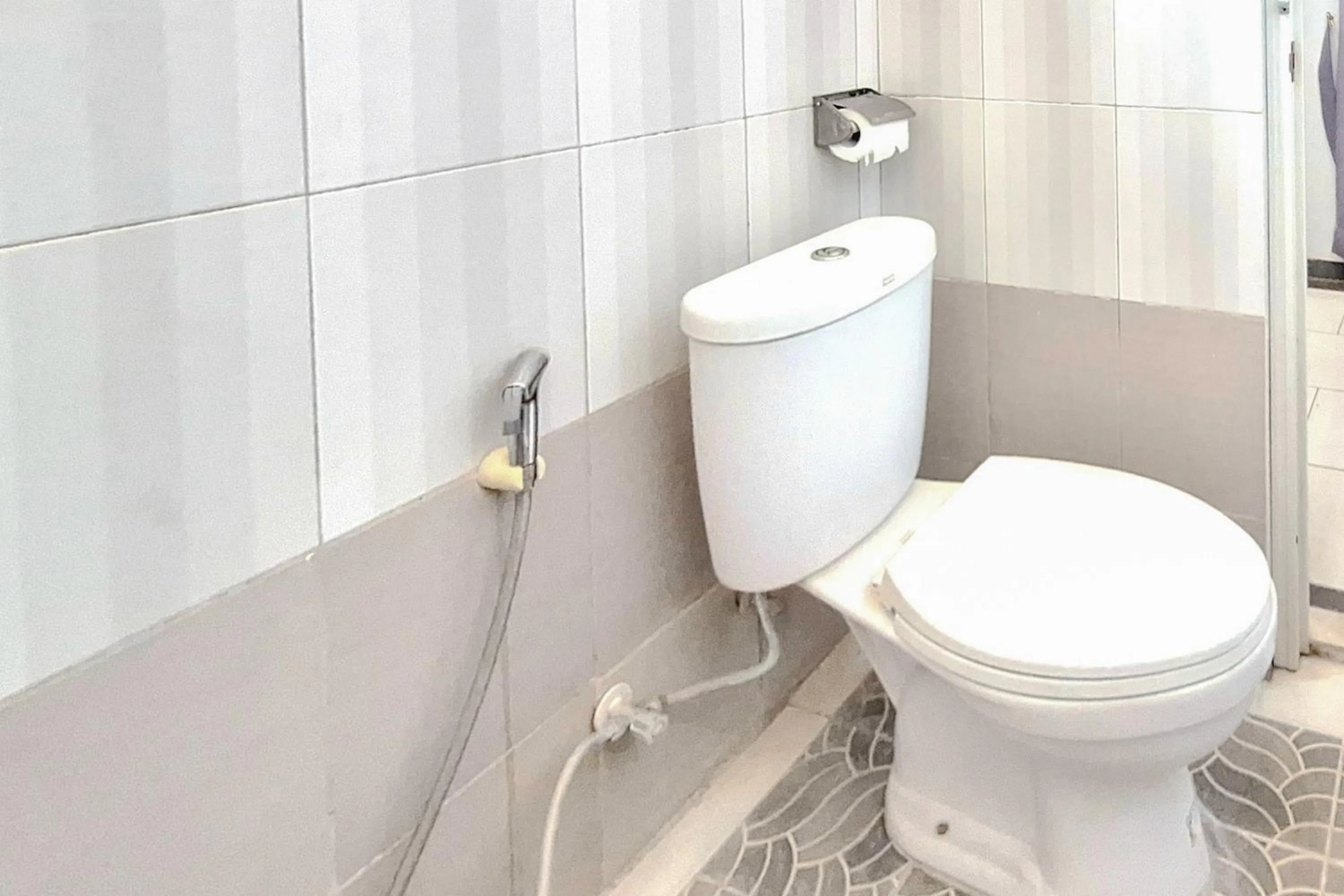 Bathroom in Urbanview The Halona near Jawa Timur Park 4