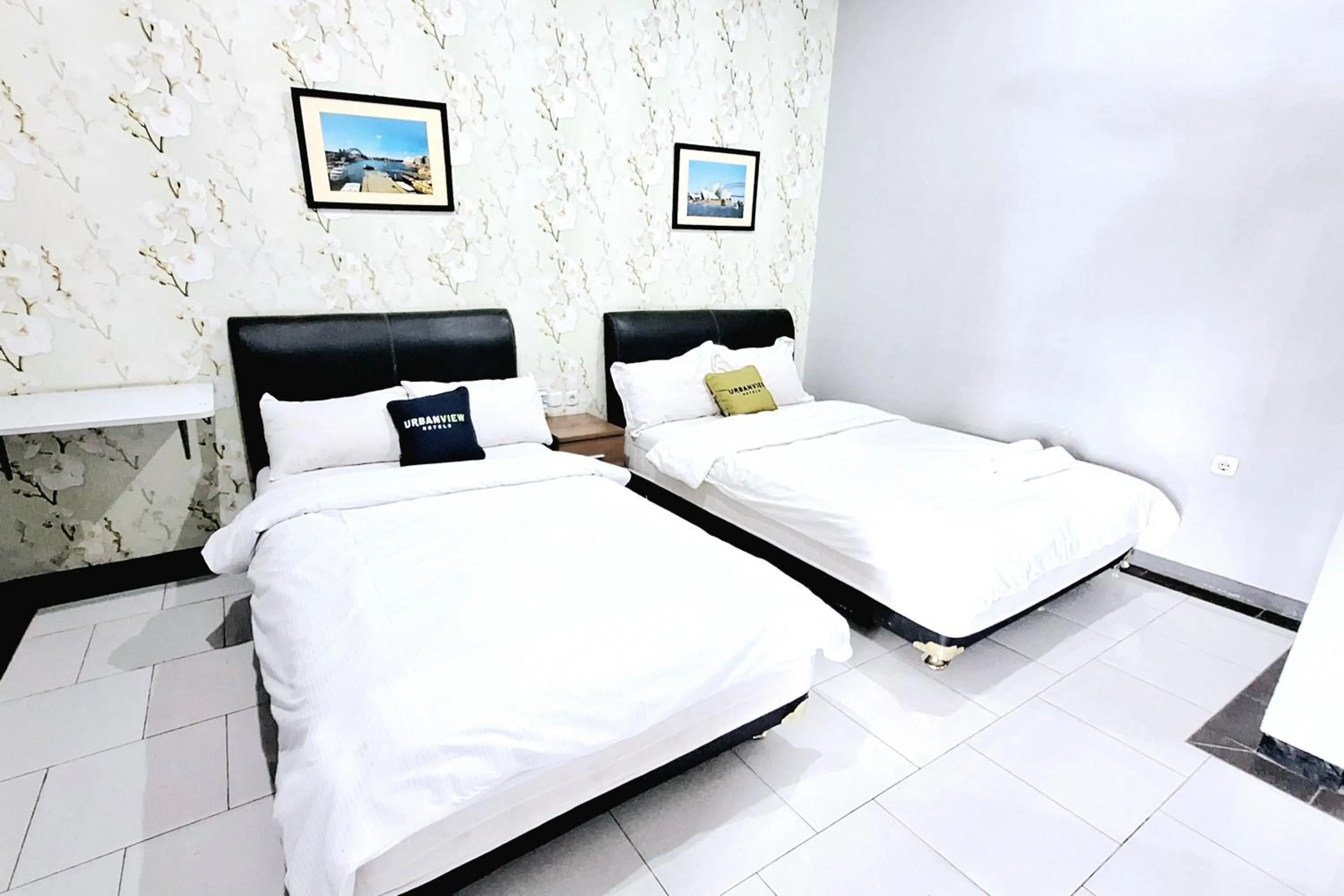 Bedroom, Bed in Urbanview The Halona near Jawa Timur Park 4
