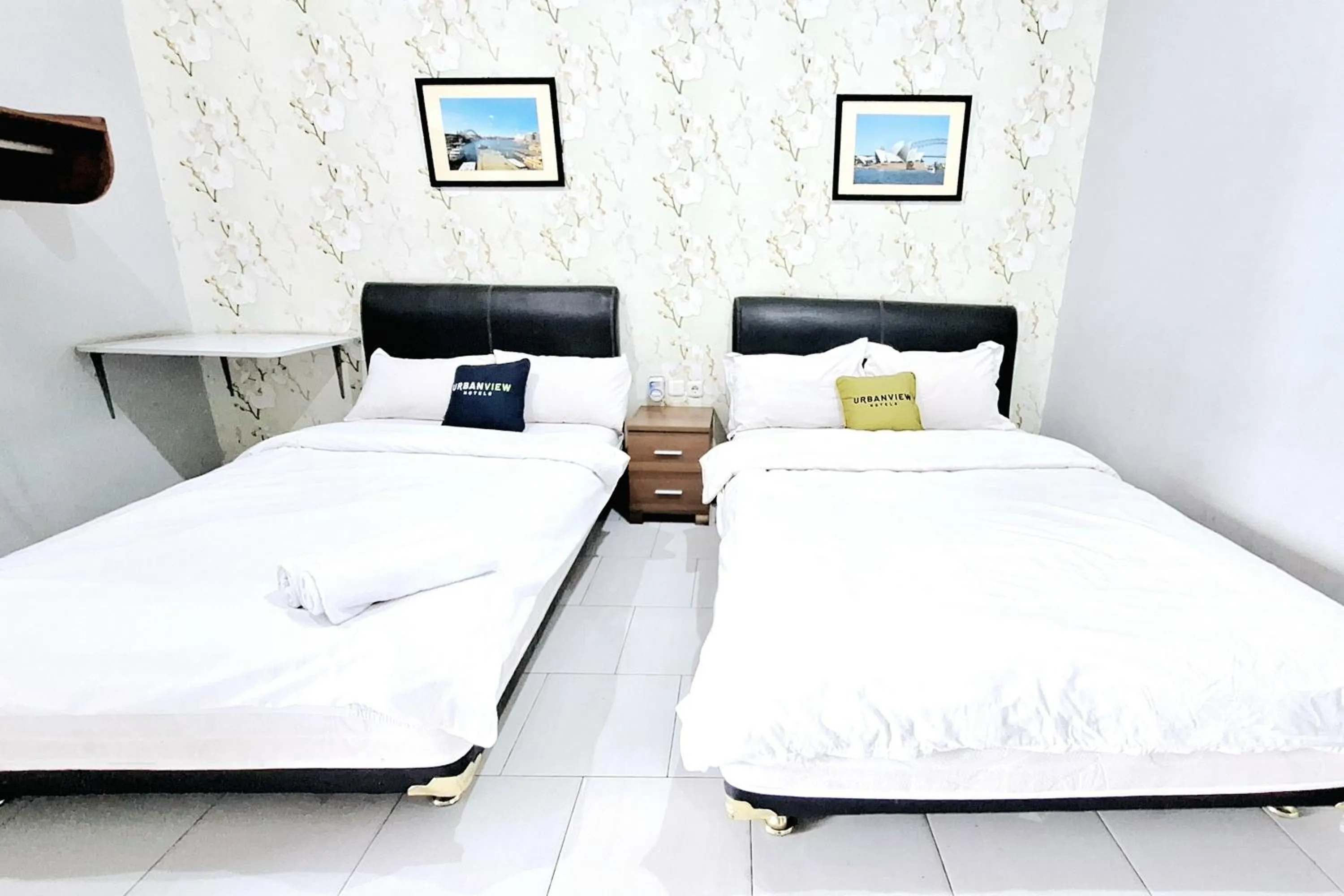 Bedroom, Bed in Urbanview The Halona near Jawa Timur Park 4