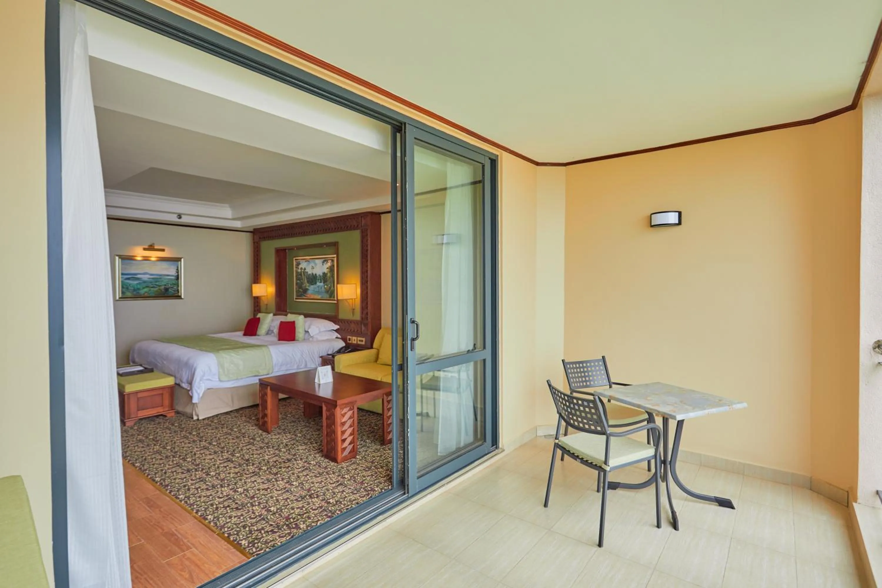 Balcony/Terrace, Bed in Goma Serena Hotel