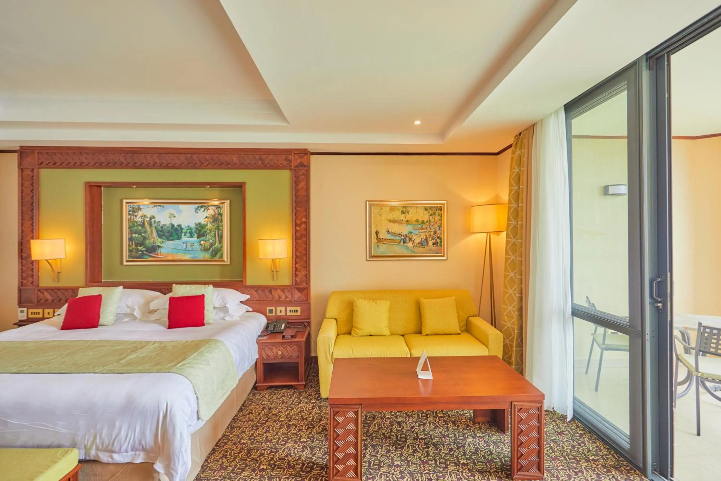 Seating area, Bed in Goma Serena Hotel